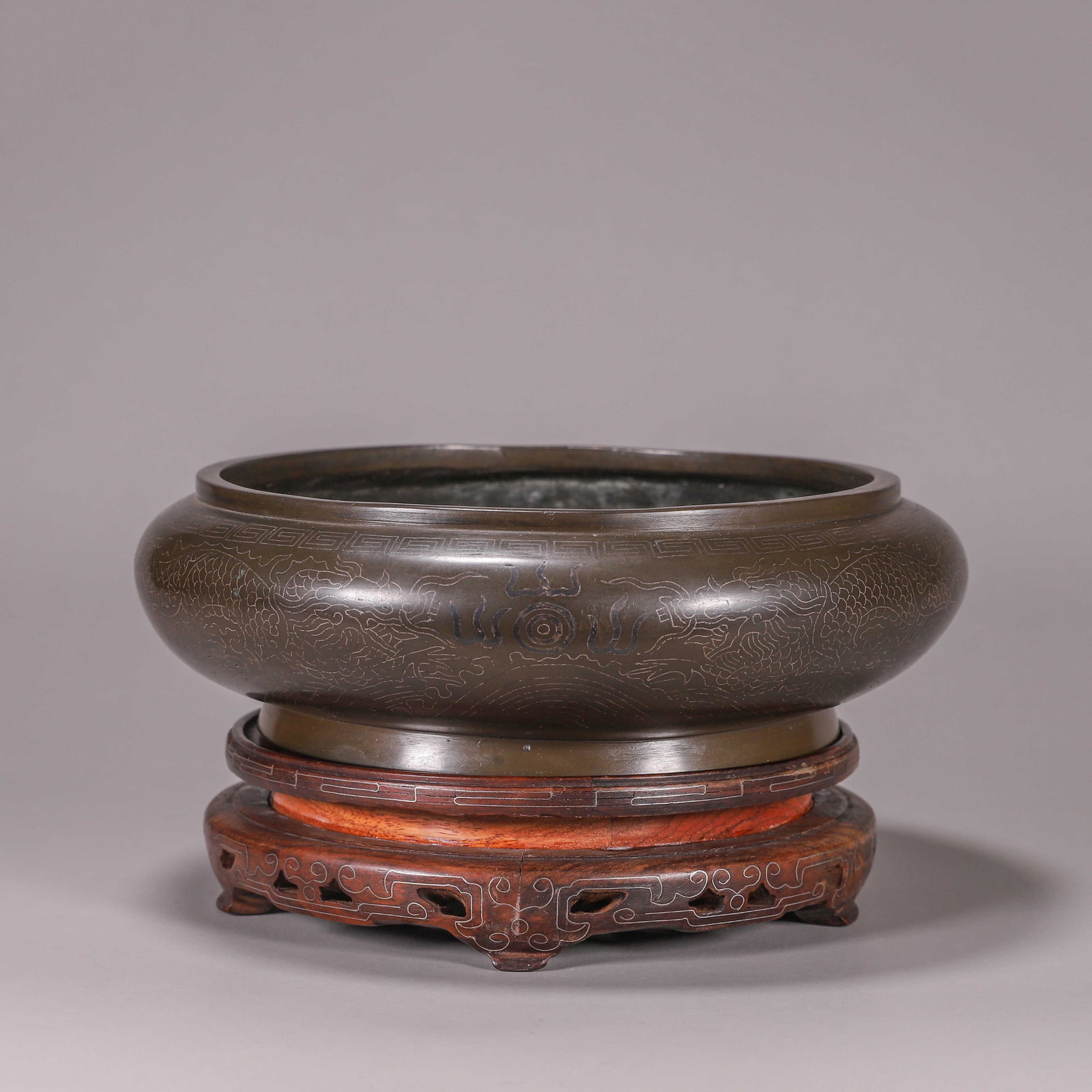 A dragon patterned silver-inlaid copper censer (1 of 9)