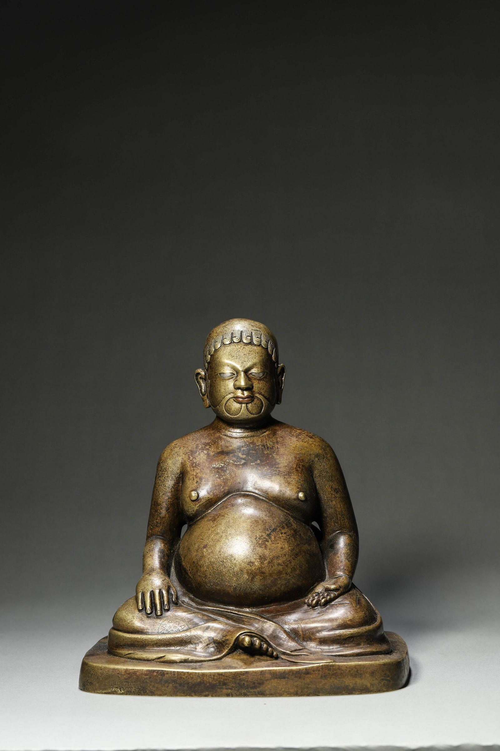 A silver-inlaid copper buddha statue (1 of 13)