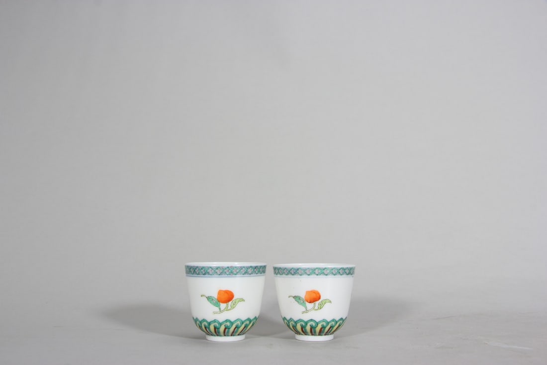 A pair of doucai fruit porcelain cups,Qing Dynasty,China: H:4.2cm,CAL:4.6cm