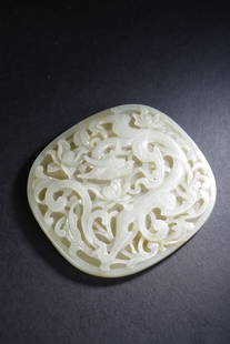 A dragon patterned white jade ornament,Qing Dynasty,China: L:10.5cm