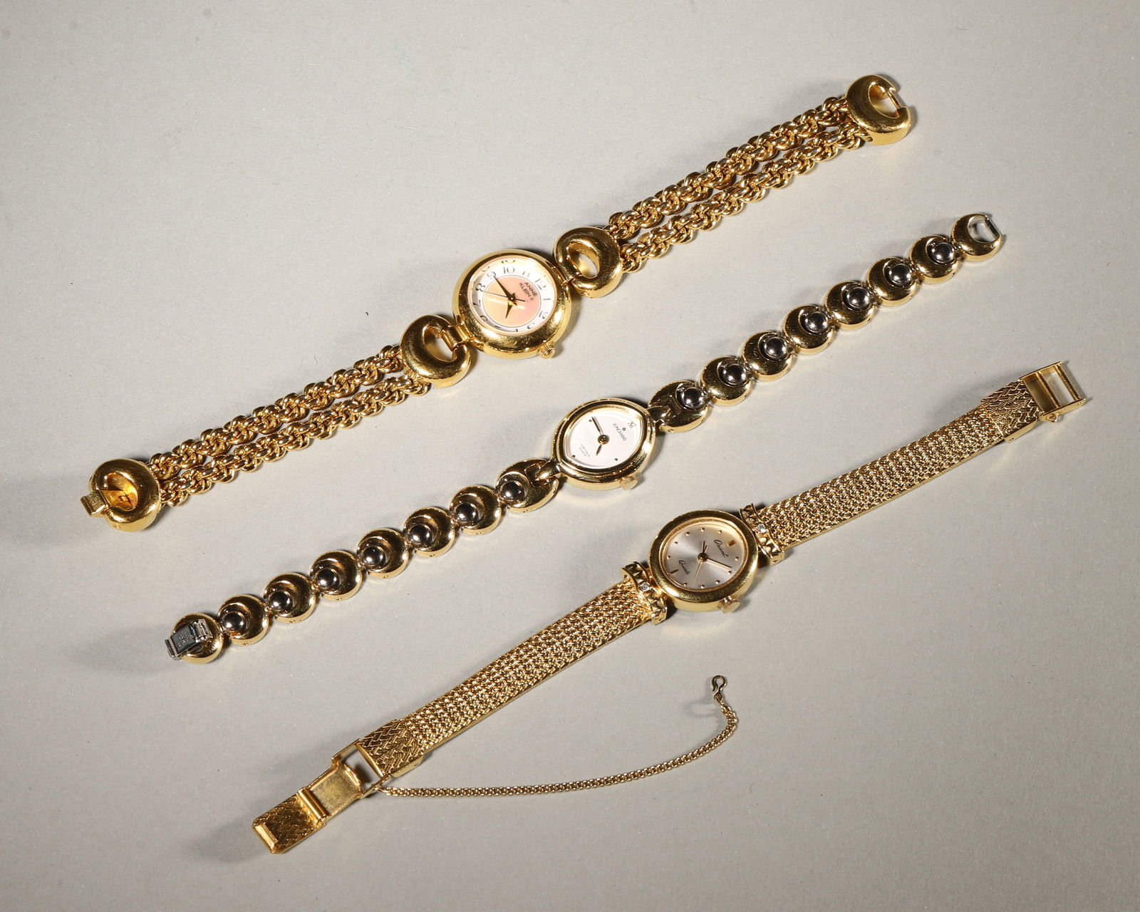 A Set of 18K Gold - Plated Quartz Pocket Watches: D:2.2cm,42g,1.7cm,31g,1.9cm,23g D:0.87in. All measurements are approximate.