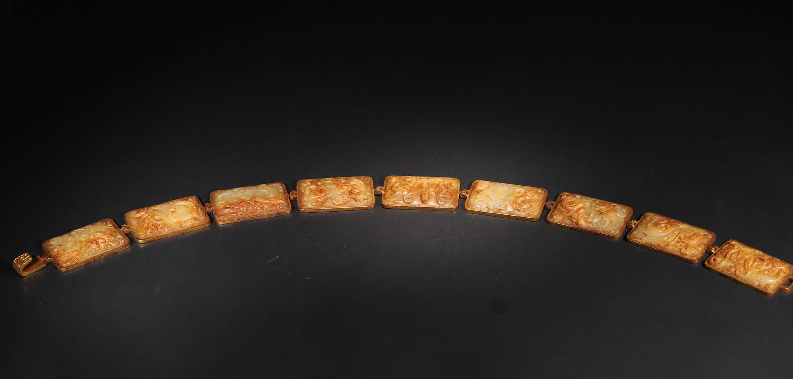 Han dynasty: a set of copper-gilt mounted jade belt plates with chilong motifs (1 of 13)