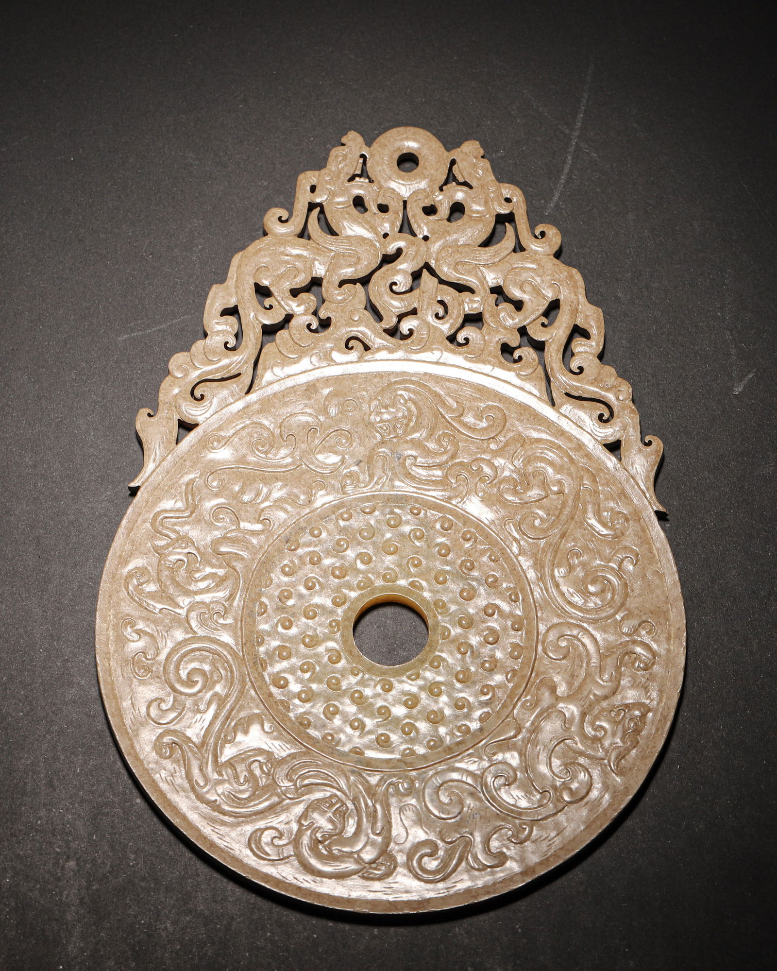 Han dynasty archaic jade openwork bi disc with double chi-dragon protruding design (1 of 9)
