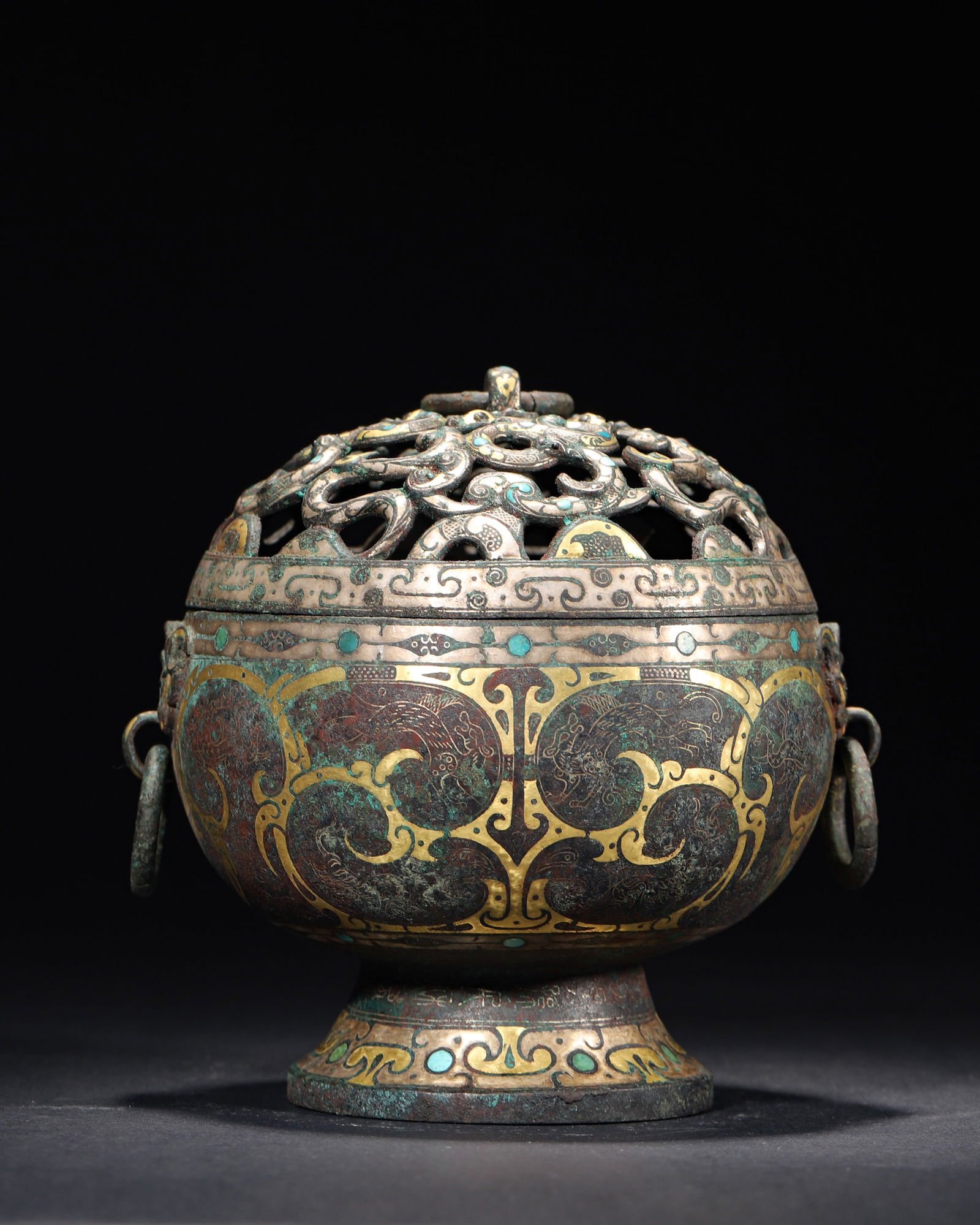 Warring states bronze censer with gold silver inlay, gemstones & openwork dragon motifs: This warring states bronze censer features gold silver inlay, turquoise, openwork dragon lid, dragon-phoenix motifs, and beast-head rings. Inscribed, it’s a rare pre-qin ritual incense vessel, embod