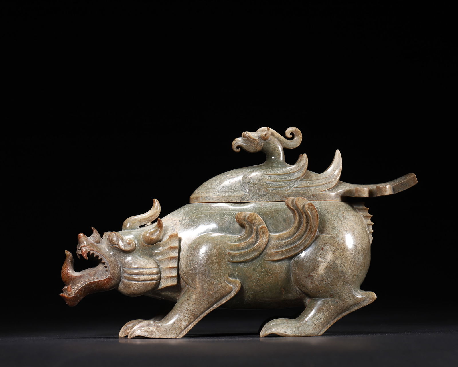 Han dynasty, a rare green jade censer in the form of a mythical beast with phoenix knob (1 of 9)