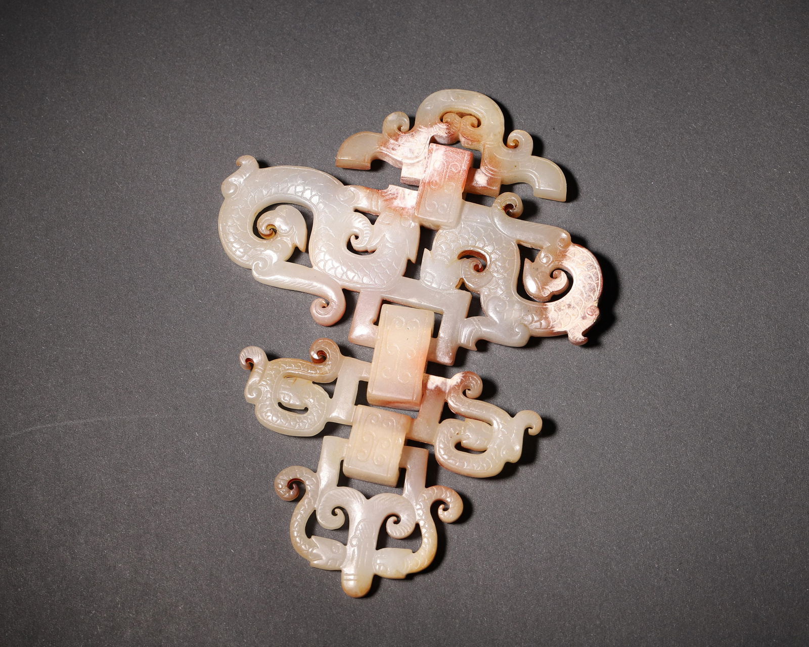 Warring states period, white jade openwork pendant with dragon and phoenix motif (1 of 6)