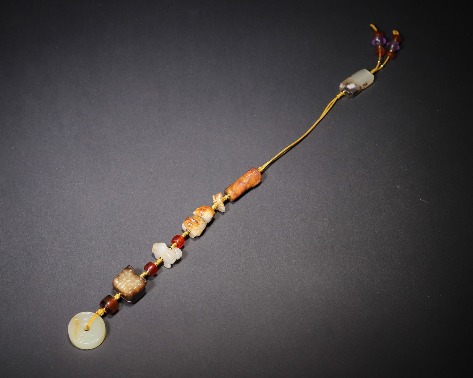 Han to tang dynasty, ancient jade and agate pendant set with beast motifs (1 of 8)