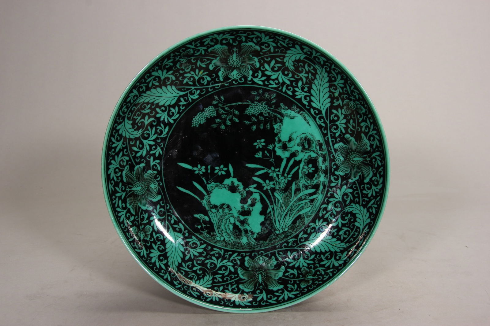 Qing dynasty yongzheng period, large black-ground green-enameled dish with "immortals celebrating (1 of 9)