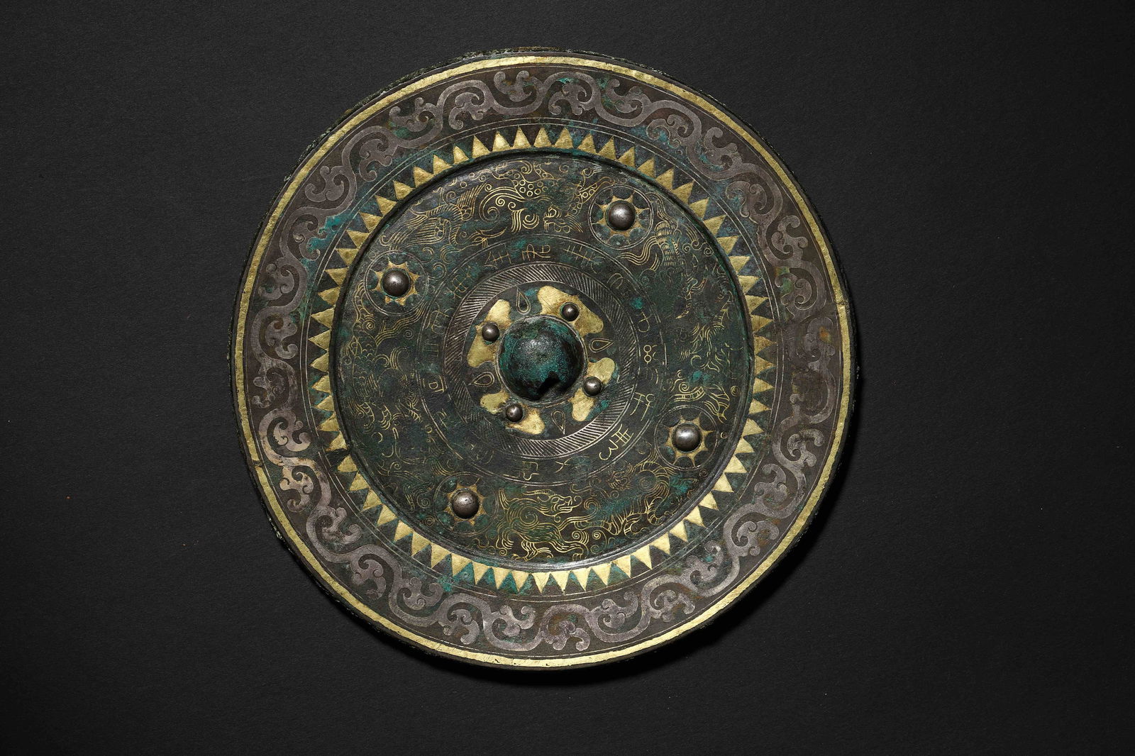 Han dynasty gold-and-silver-inlaid bronze mirror with four-stud & mythical beast patterns (1 of 4)