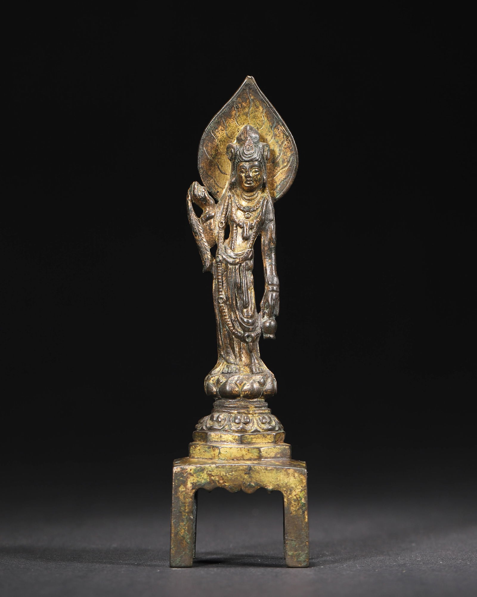 Tang dynasty gilt-bronze standing guanyin with bench base (1 of 7)