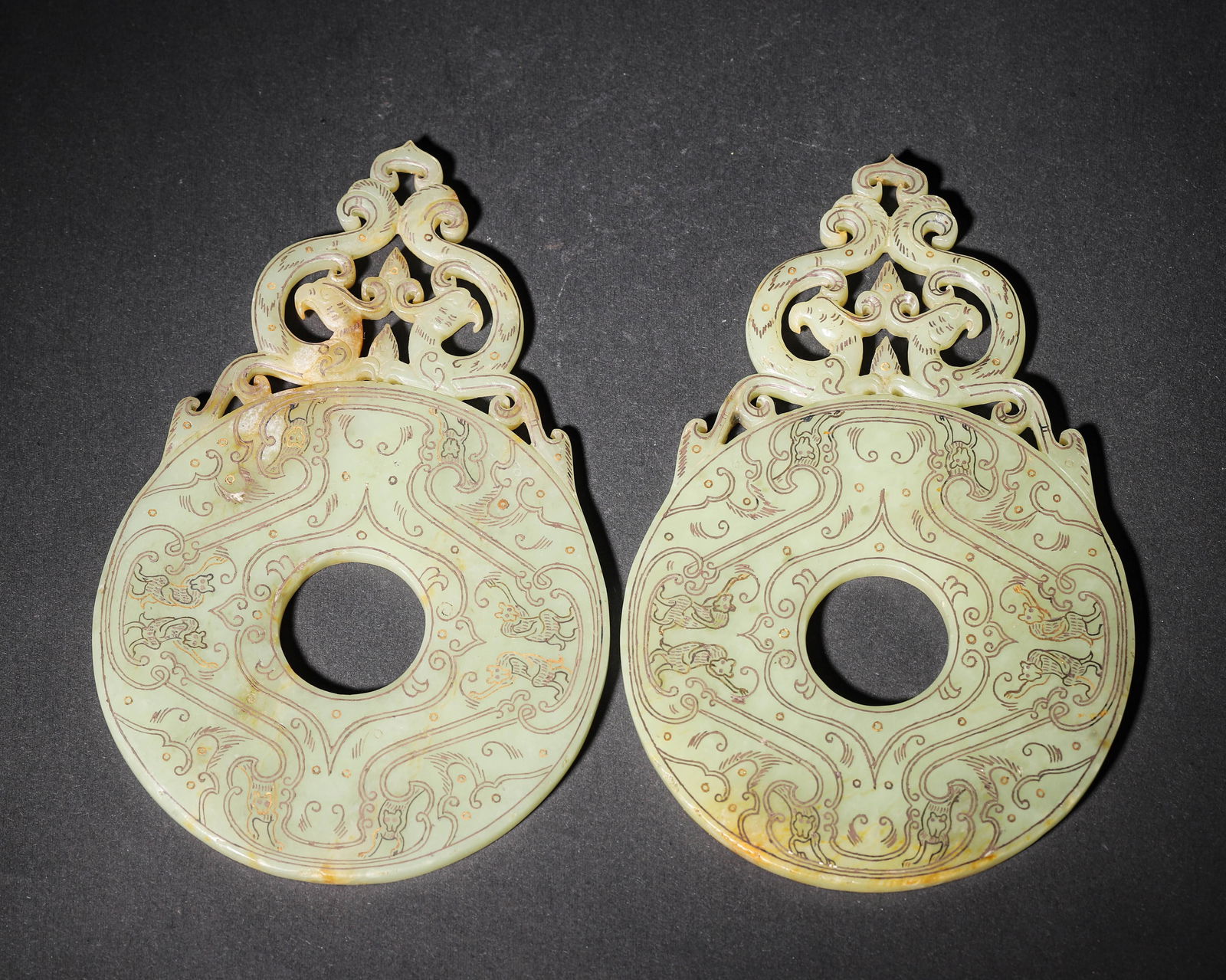 Warring states jade bi-shaped pendants (pair) with gold silver inlaid phoenix motifs (1 of 9)