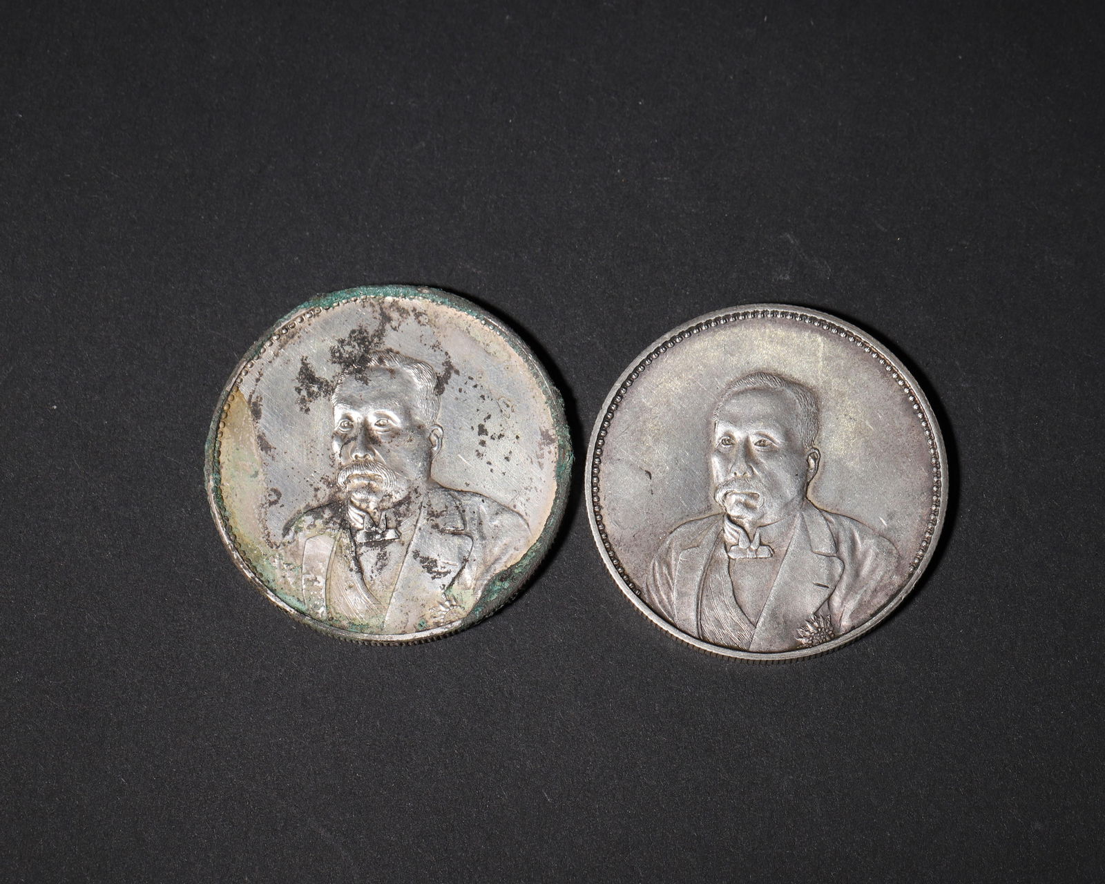 A pair of silver commemorative coins: xu shichang portrait & "ren shou tong deng" design (1 of 7)