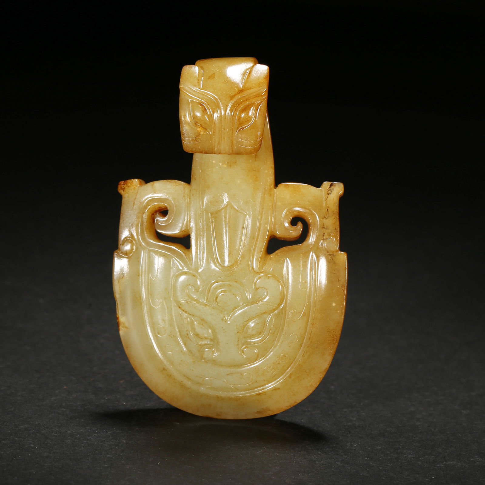Han dynasty, yellow hetian jade belt hook with beast head and mask pattern (1 of 2)