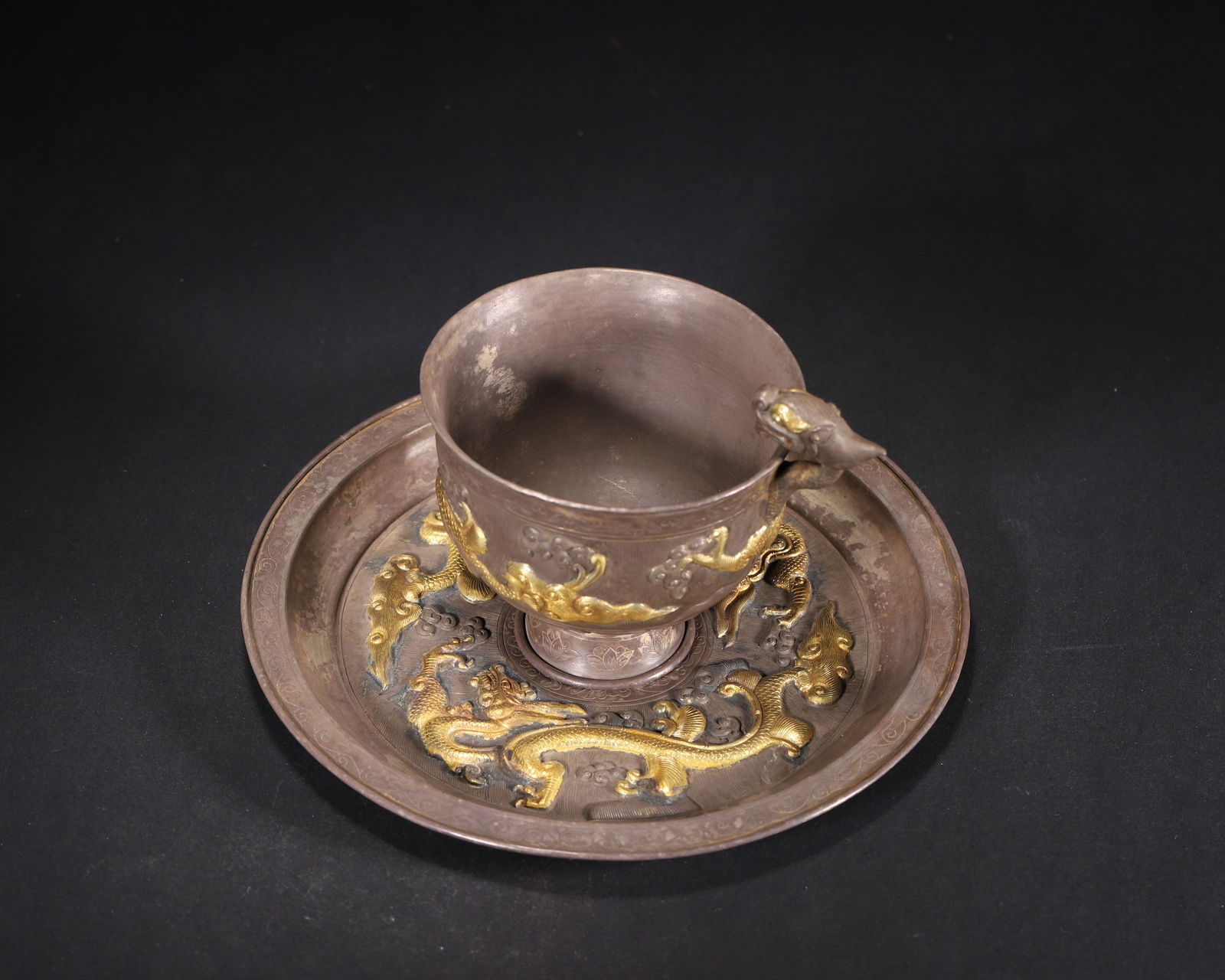 Tang dynasty, a set of silver-gilt stem cup and stand with dragon motifs (1 of 11)