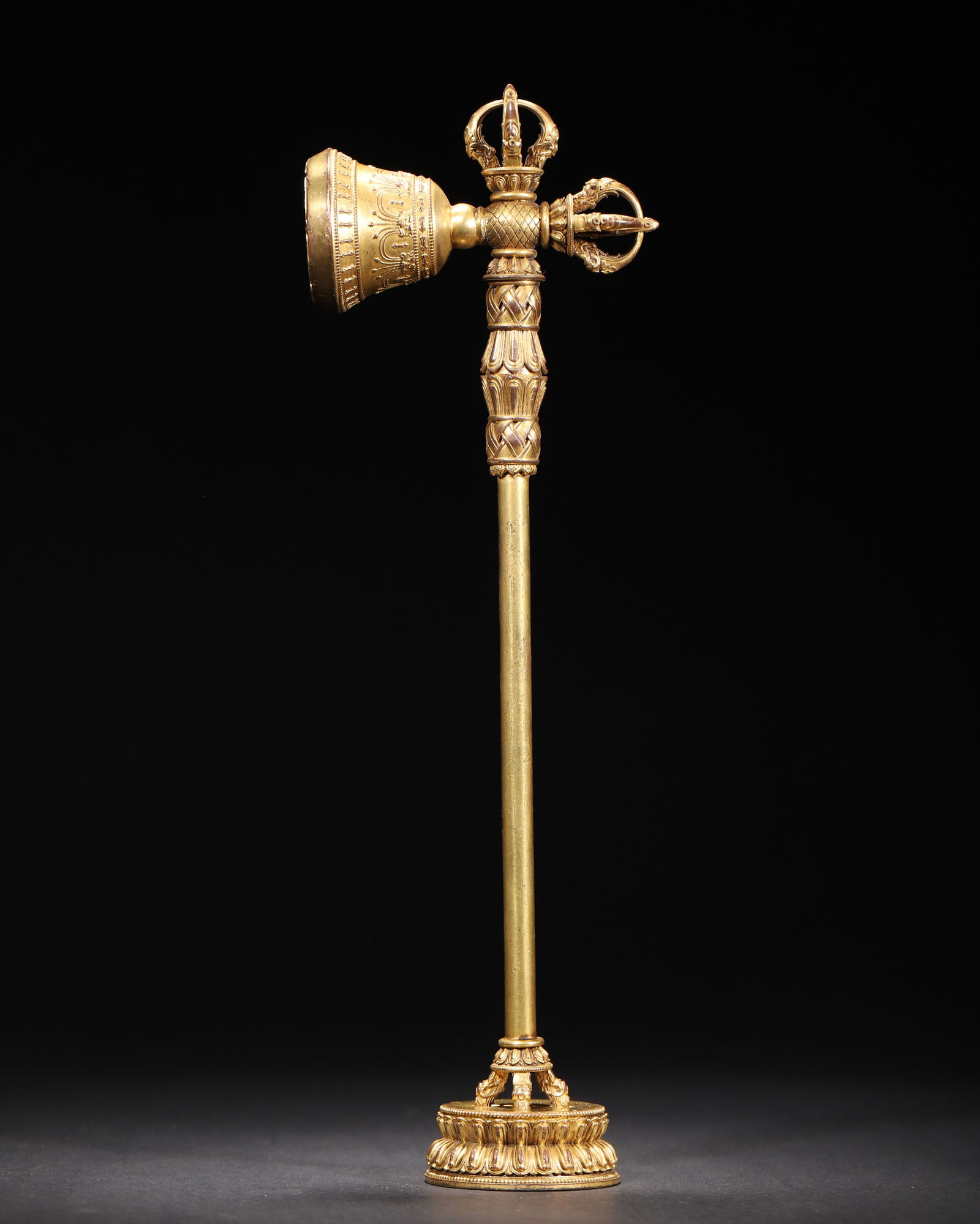 Mid-qing dynasty gilt bronze vajra bell and pestle ritual implement: An imperial tibetan ritual implement from the mid-qing dynasty, combining a vajra bell with a five-pronged pestle, symbolizing the union of wisdom and compassion. The thick, lustrous gilding and exqui