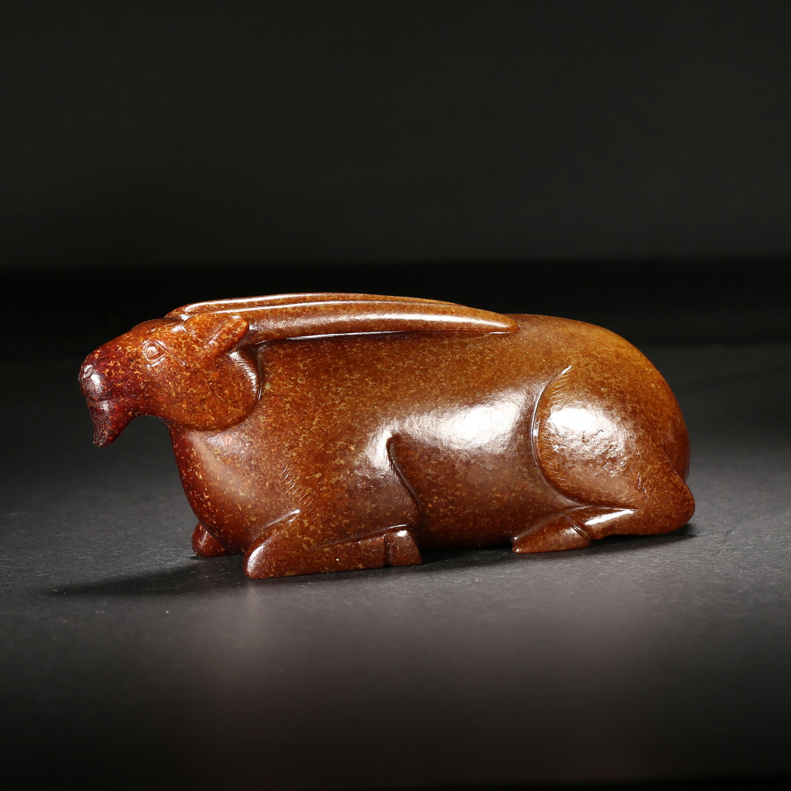 Han dynasty, hetian jade recumbent ram with red patina (1 of 2)