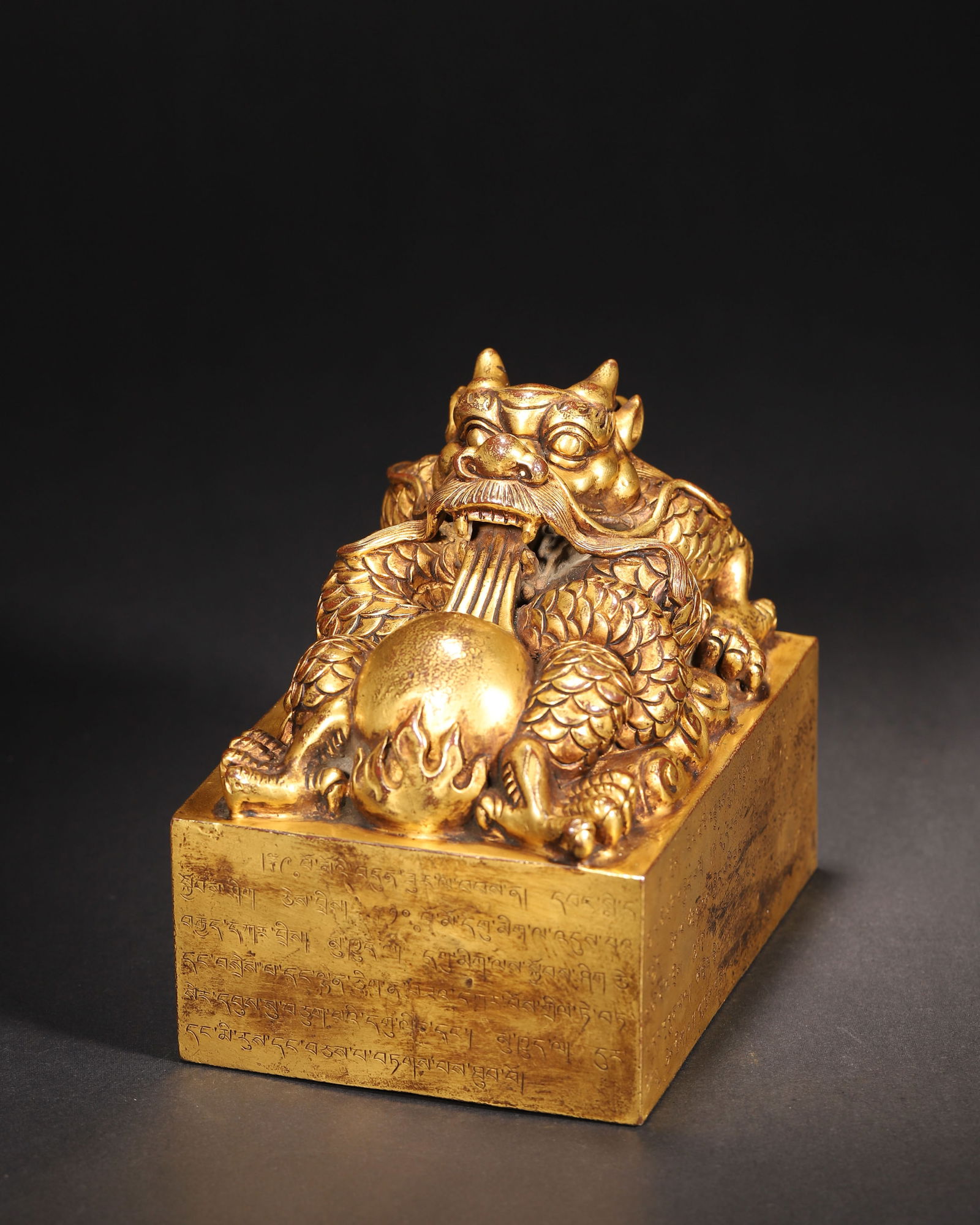 Qing dynasty, qianlong-jiaqing period, gilt bronze dragon knob imperial seal with four-script (1 of 11)