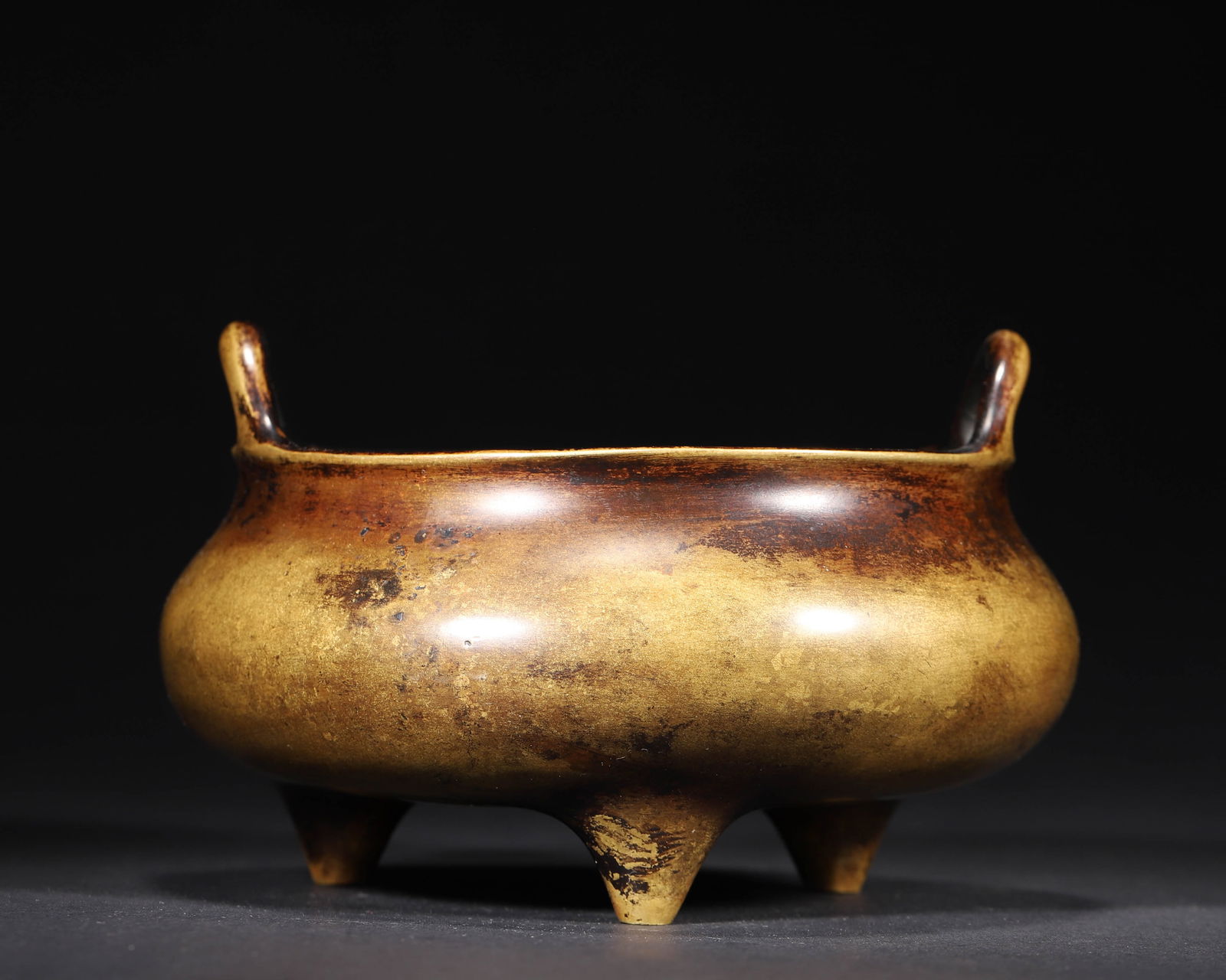 Ming dynasty, xuande mark bronze censer with upright handles and three feet (1 of 7)