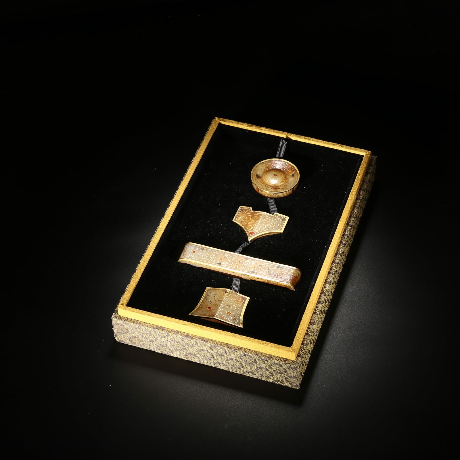 Warring states to han dynasty, a set of hetian jade belt fittings with gold and silver inlaid cloud (1 of 2)