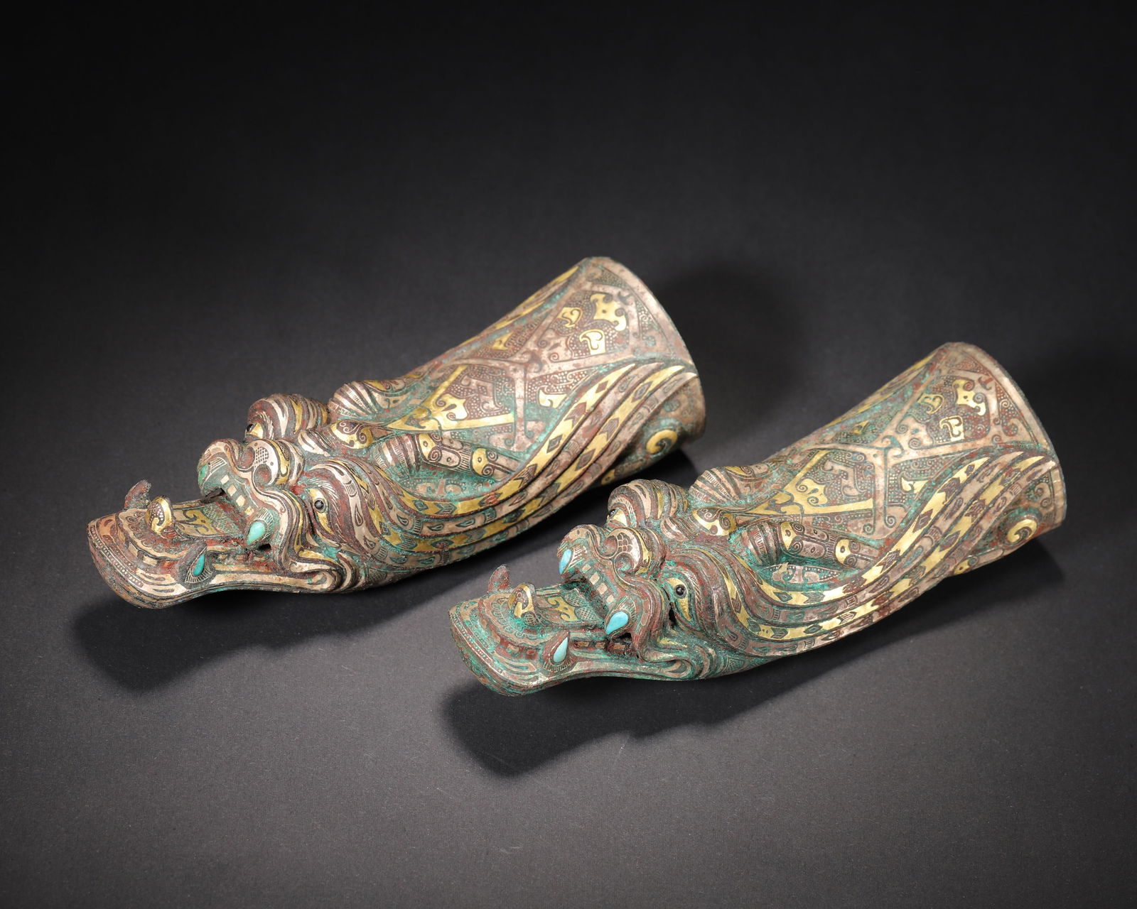 Warring states period: a pair of gold-silver-inlaid & turquoise-embedded bronze dragon-form objects (1 of 15)