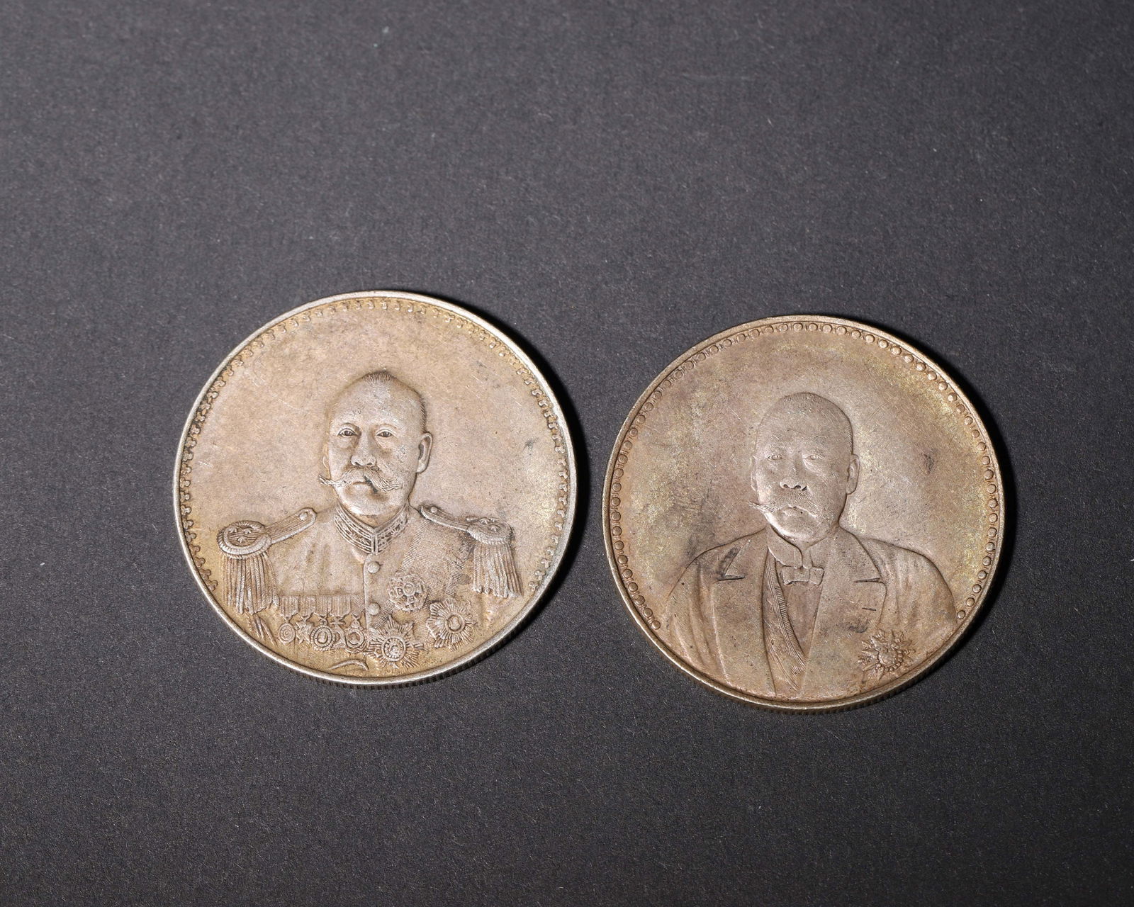 A pair of silver commemorative coins: cao kun portrait & dual flag design (1 of 7)