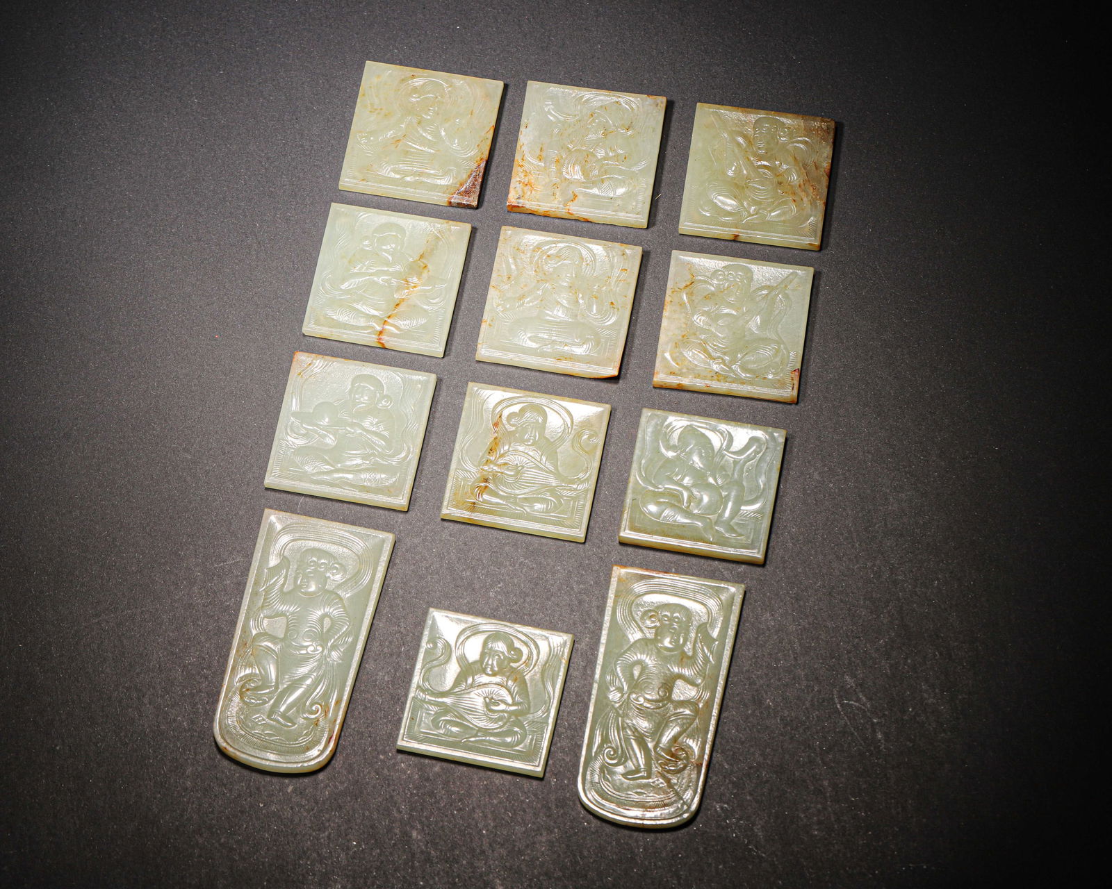 Tang dynasty, a set of twelve hetian white jade belt plaques with musicians and dancers (1 of 8)