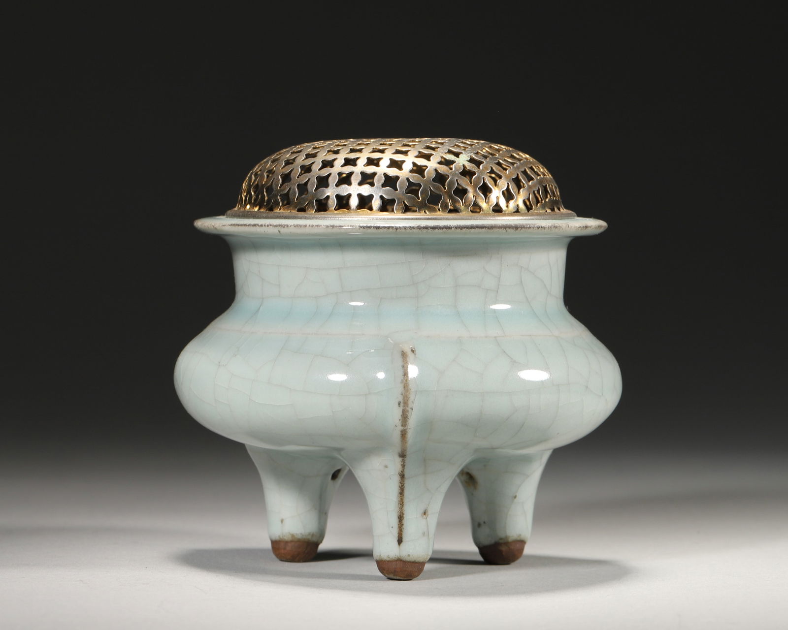 Song dynasty qingbai glaze tripod censer with copper openwork cover (1 of 7)