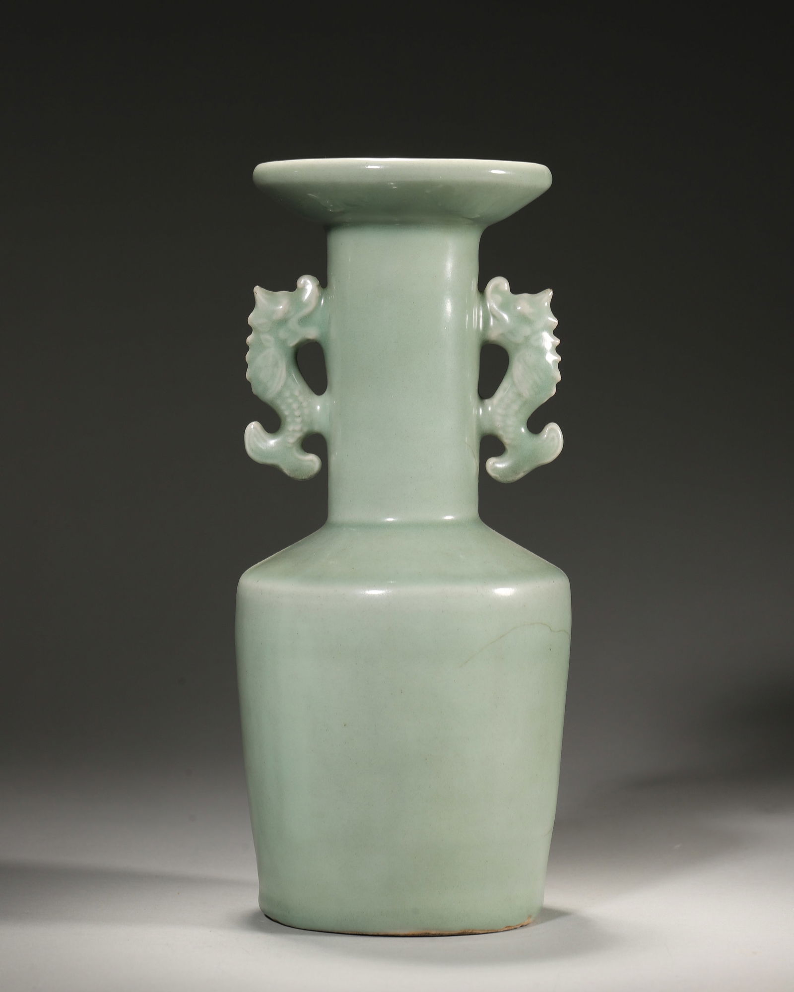 Song dynasty longquan kiln celadon vase with fish handles: A rare song longquan vase: jade-like celadon glaze, dynamic fish-handle relief, sleek shape. A classic song celadon merging longquan's glaze beauty & carving craft—a rare relic of song ceramic art &