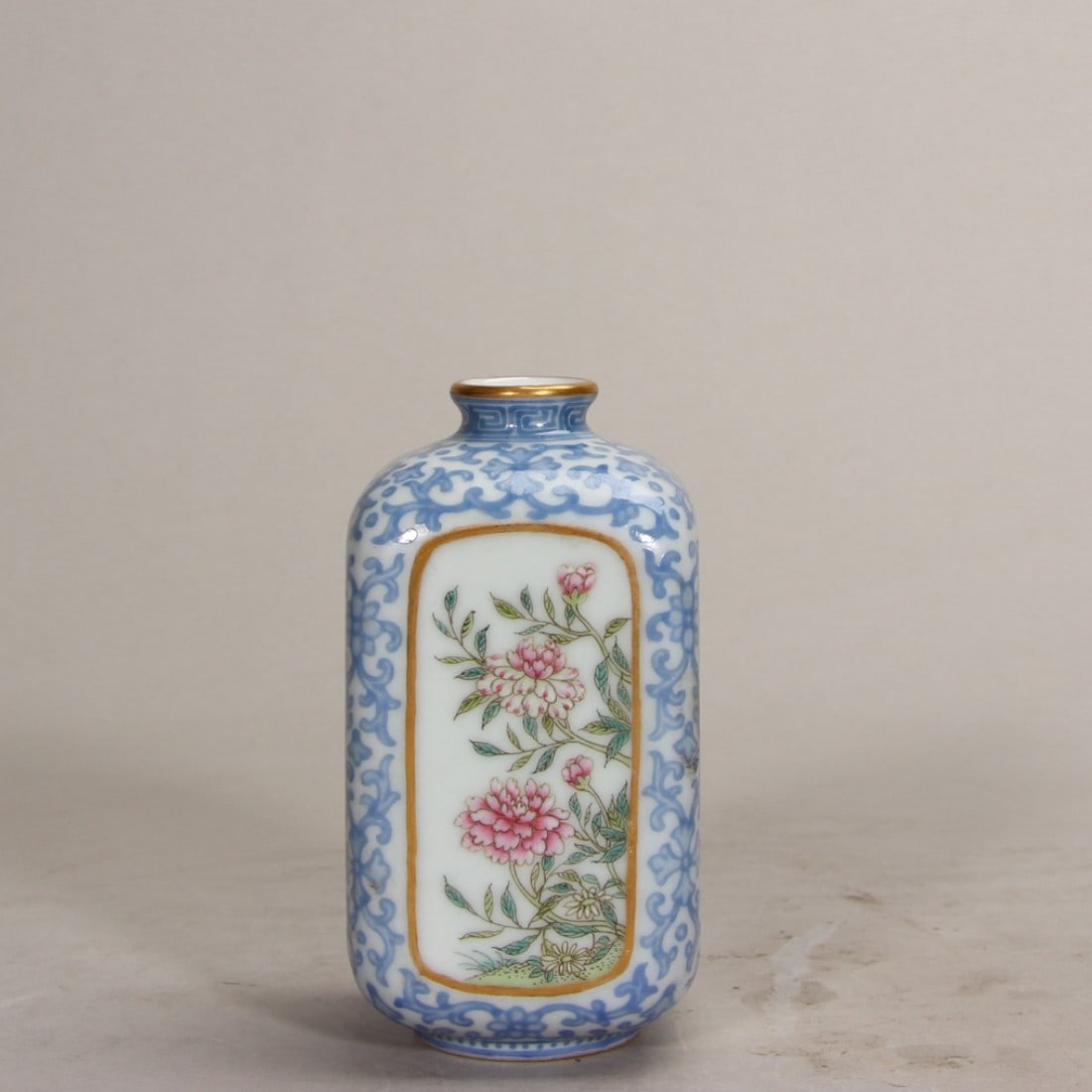 Qing dynasty qianlong period, falangcai small vase with blue-ground scrolls and floral medallion (1 of 10)