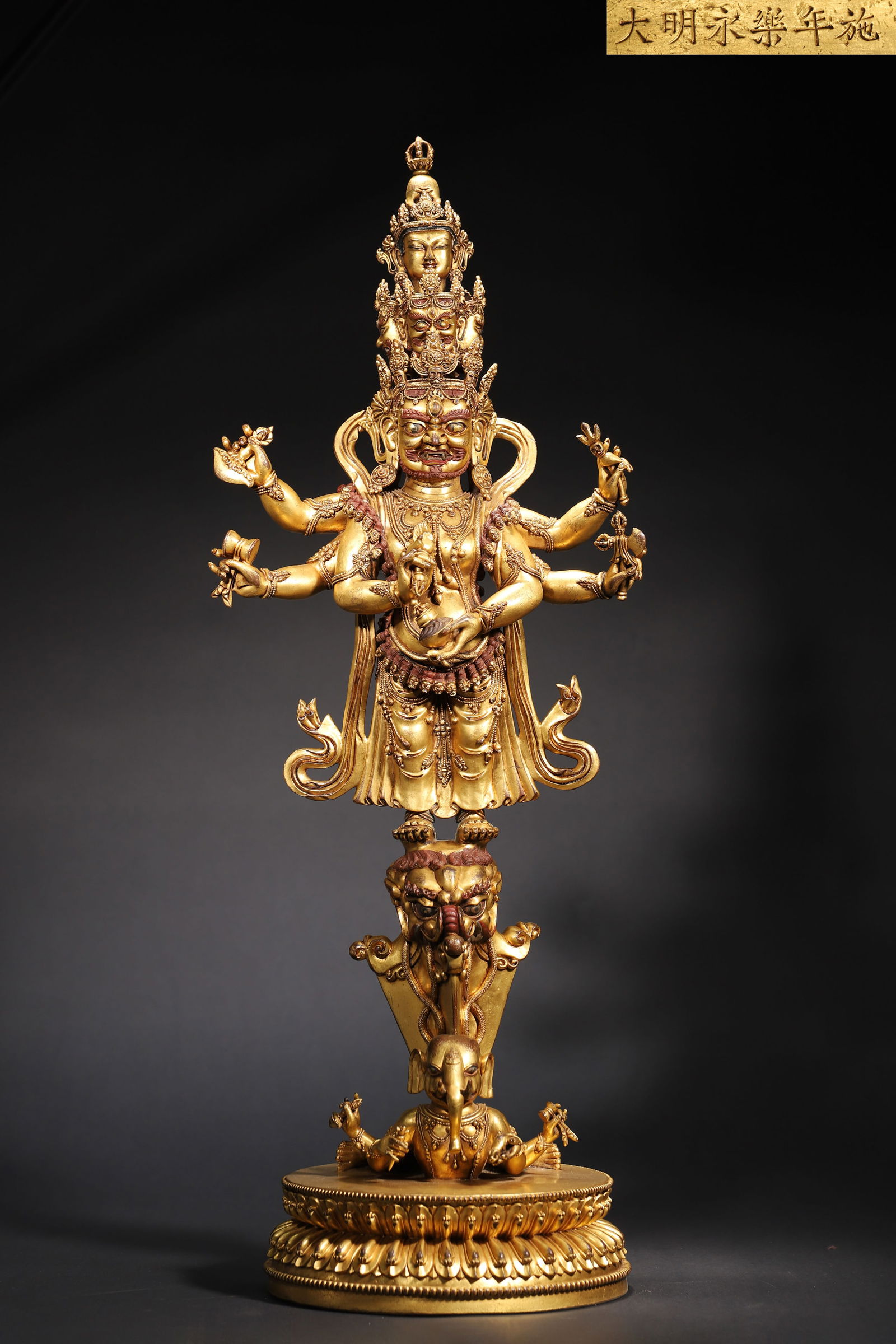 Ming dynasty, yongle period, imperially gilt bronze five-faced, six-armed protector deity (1 of 17)