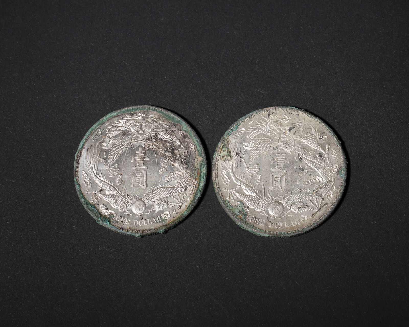 A pair of silver one-yuan coins, (long beard dragon) (1 of 7)