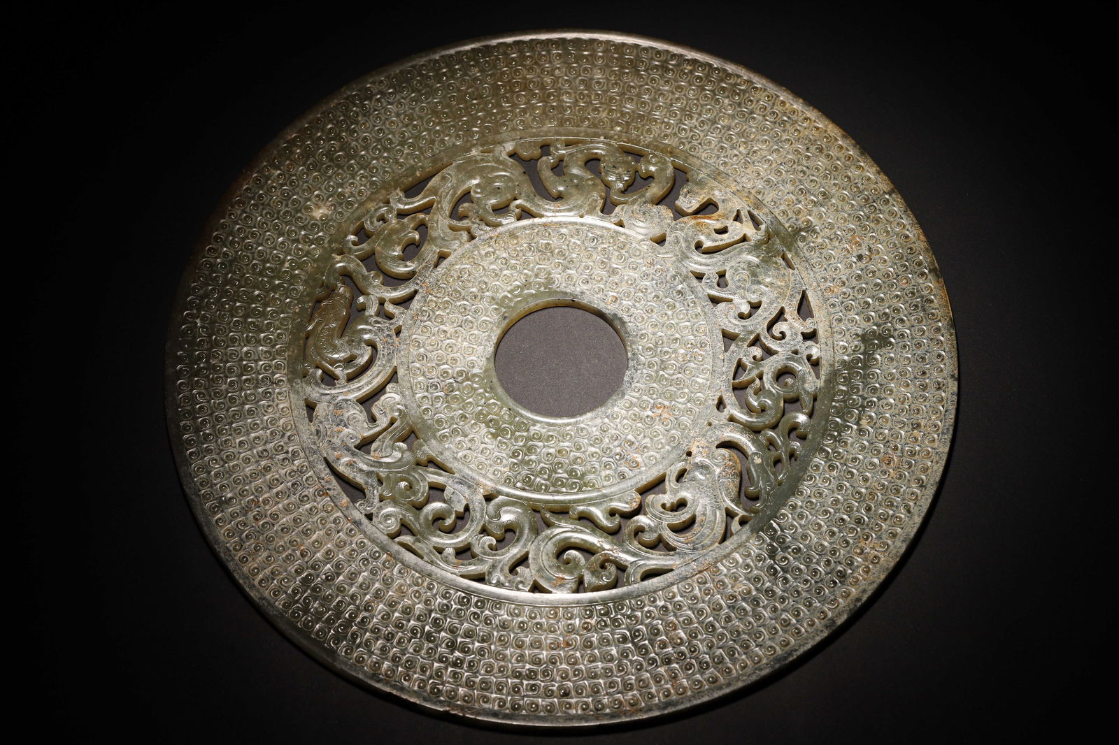 Han dynasty jade bi with grain & openwork chi-dragon motifs (1 of 8)