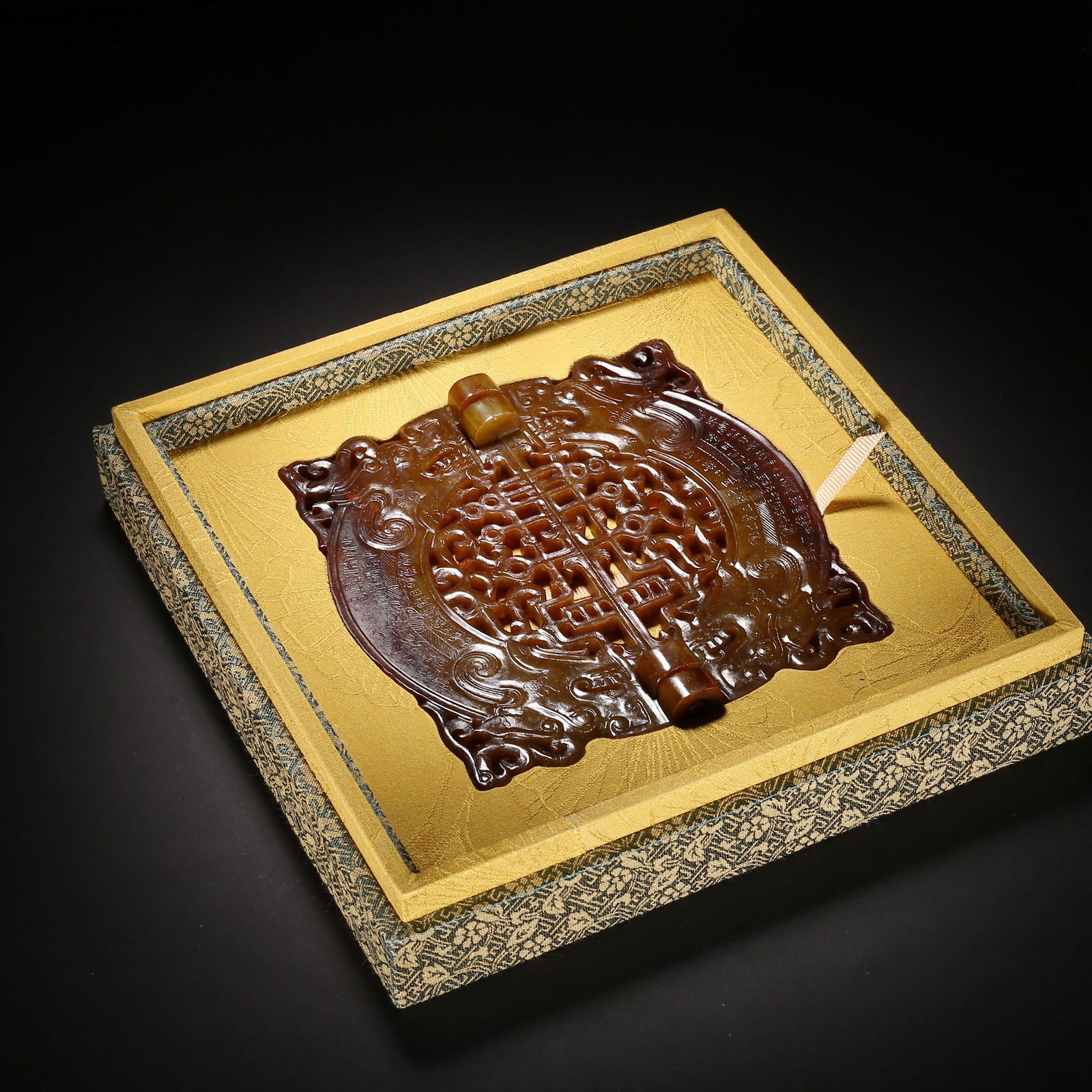 Han dynasty, yellow hetian jade double bi with openwork dragon-phoenix patterns and red patina (1 of 2)