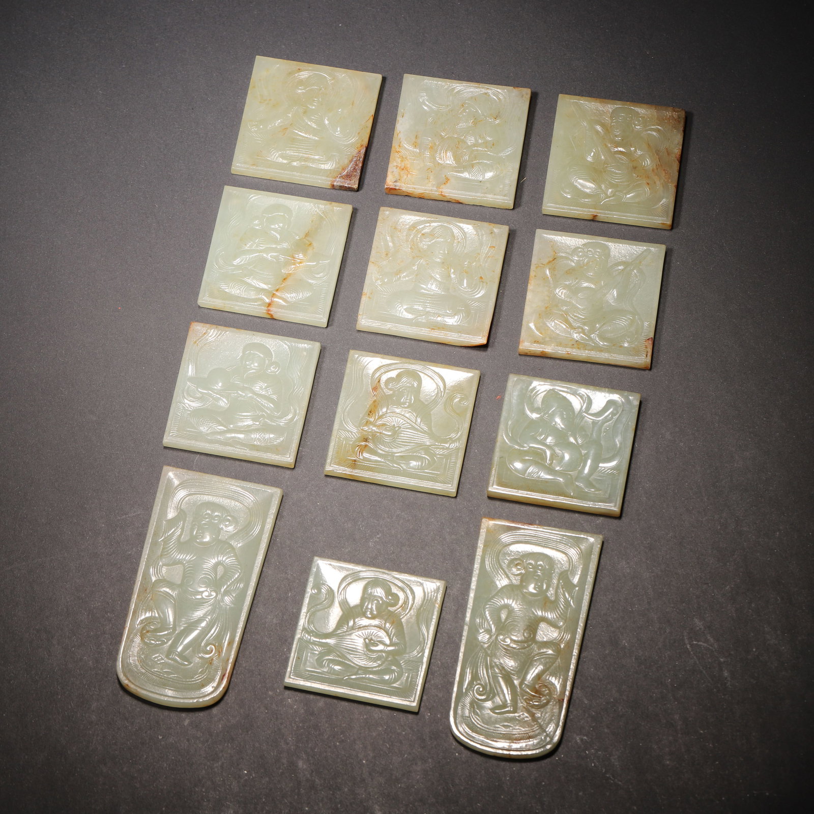 Tang dynasty, set of white hetian jade belt plaques with foreign musicians and dancers (1 of 5)