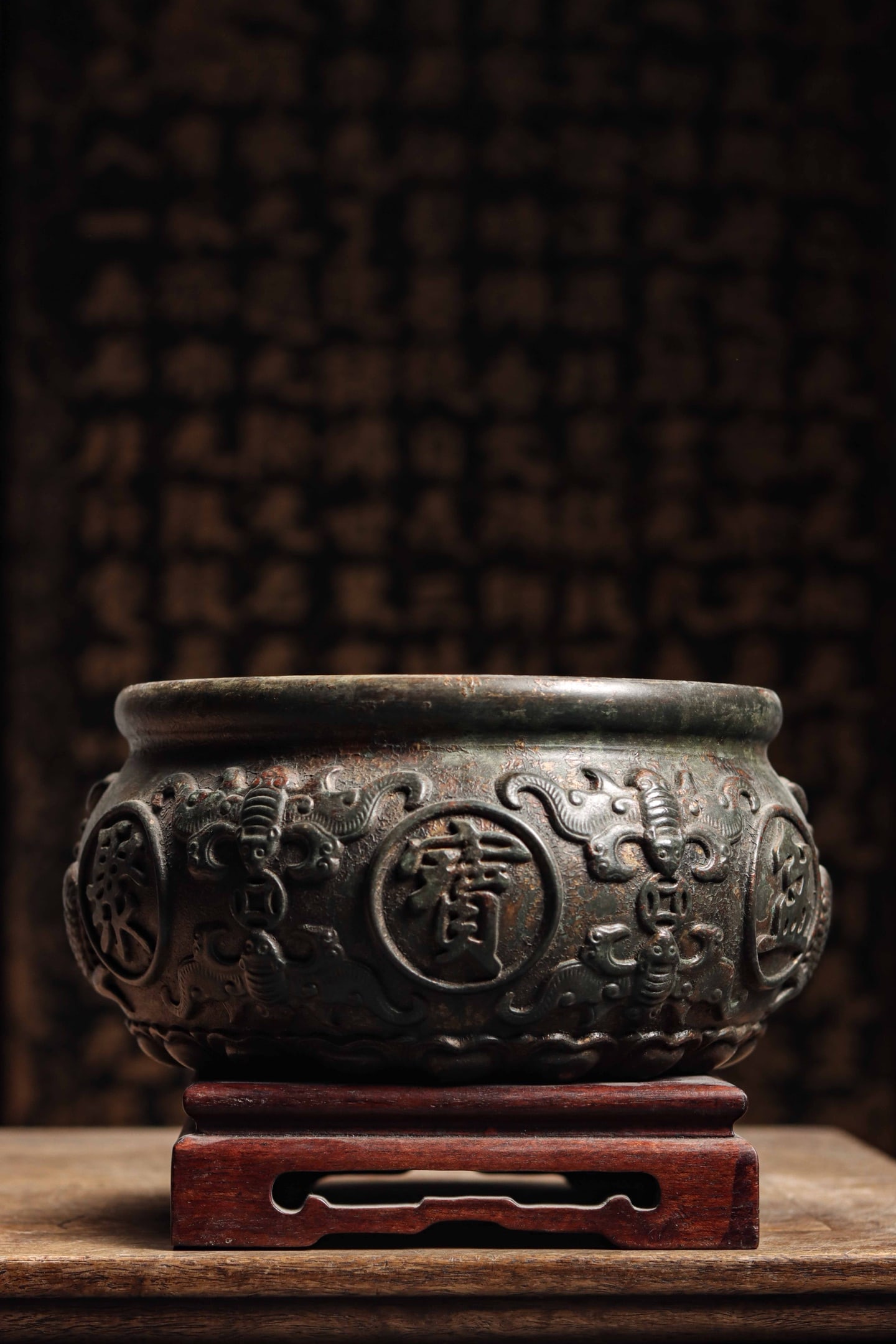 QING DYNASTY, COPPER TREASURE BASIN INCENSE BURNER: Weight:4100gH:12cmD:24cm19.5cmThis is a copper treasure basin-style incense burner, a traditional artifact that combines practicality and auspicious meanings.It is made of bronze, with a full and roun