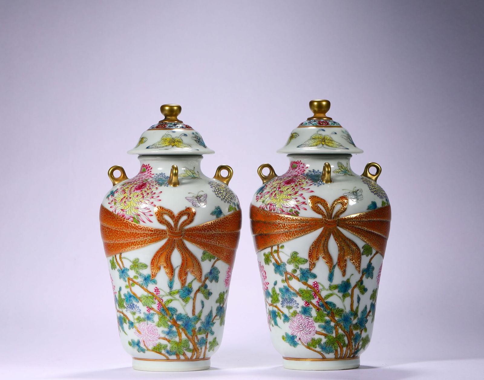 A PAIR OF PASTEL COVERED JARS FROM THE QIANLONG PERIOD OF THE QING DYNASTY (1 of 7)