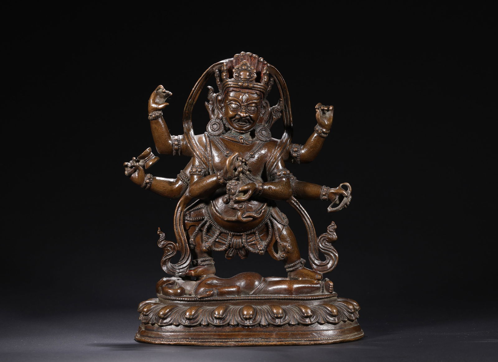 A 15TH-CENTURY BRONZE SIX-ARMED MAHAGALA BUDDHA STATUE (1 of 9)