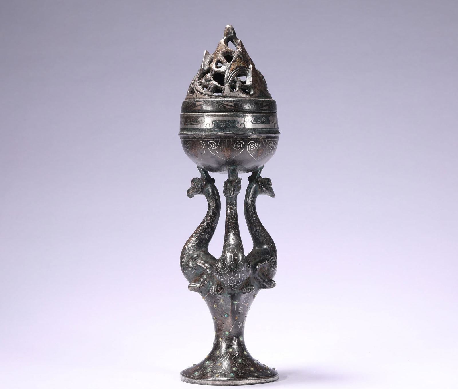 A INCENSE BURNER MADE OF COPPER WITH GOLD AND SILVER AND PHOENIX HEADS FROM THE HAN DYNASTY: H:25cmW:7.5cmWeight:760g