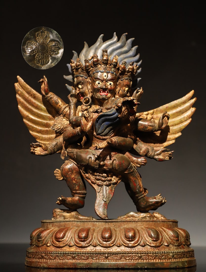 A GILDED BRONZE STATUE OF THE MING KING WITH A HORSE-HEAD: Weight:4250gH:32cmL:28cmW:17cm This is a copper gilded Vajrayana statue in the style of Tibetan Buddhism during the Qing Dynasty. It is an important statue of the main deity and protector deity in Tib