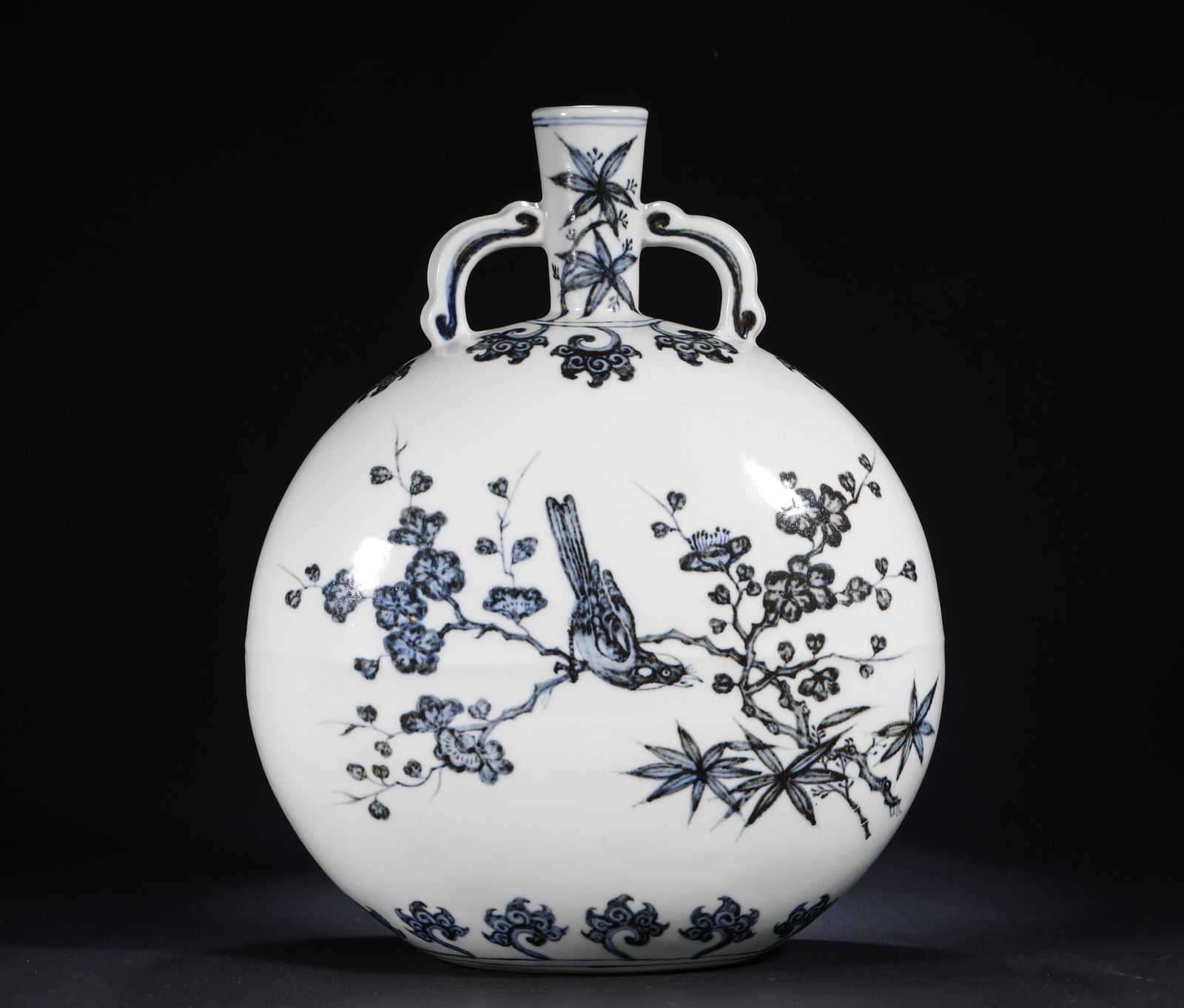 BLUE AND WHITE FLOWER-AND-BIRD MOON-HUGGING VASE OF THE MING DYNASTY: H:35cmW:24cm This is a blue and white "Xi Shang Mei Zhi" patterned moon hugging vase from the Yongle period of the Ming Dynasty, which is a classic type of blue and white porcelain from official kilns