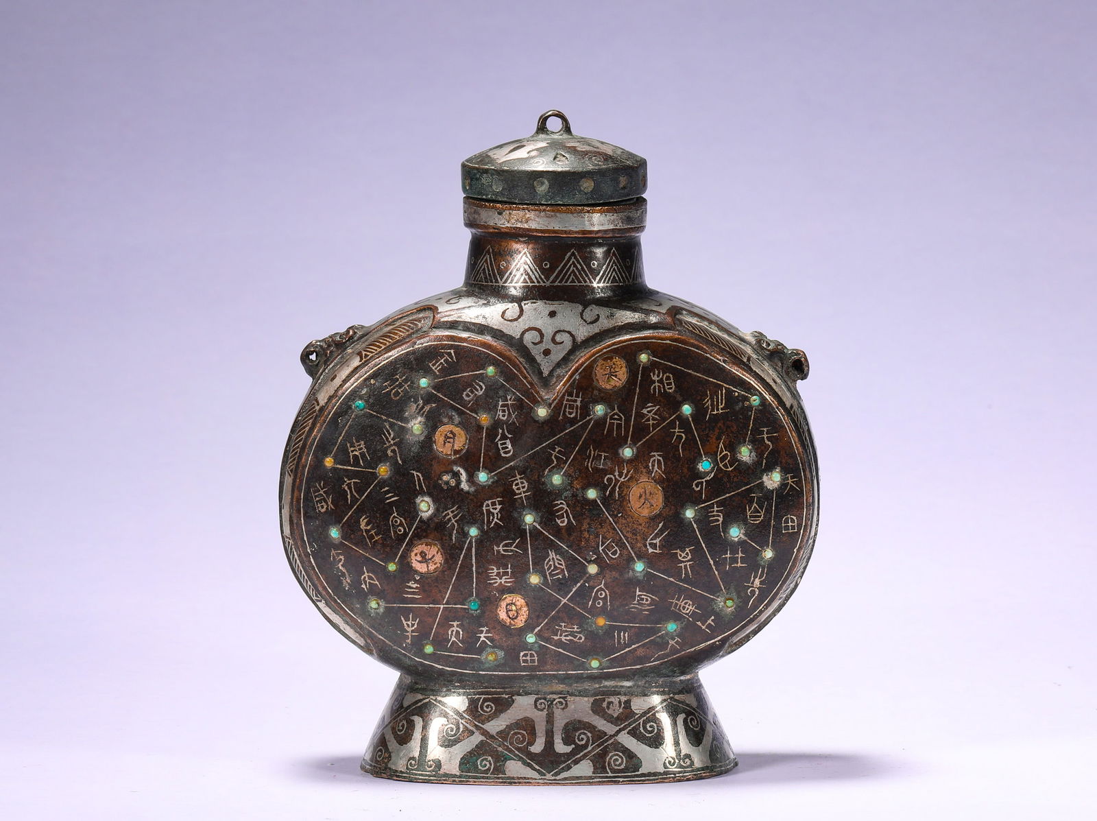 IN THE TANG DYNASTY, A COPPER VASE WITH GOLD AND SILVER STAR PATTERNS: H:14.3cmW:12cmWeight:850g
