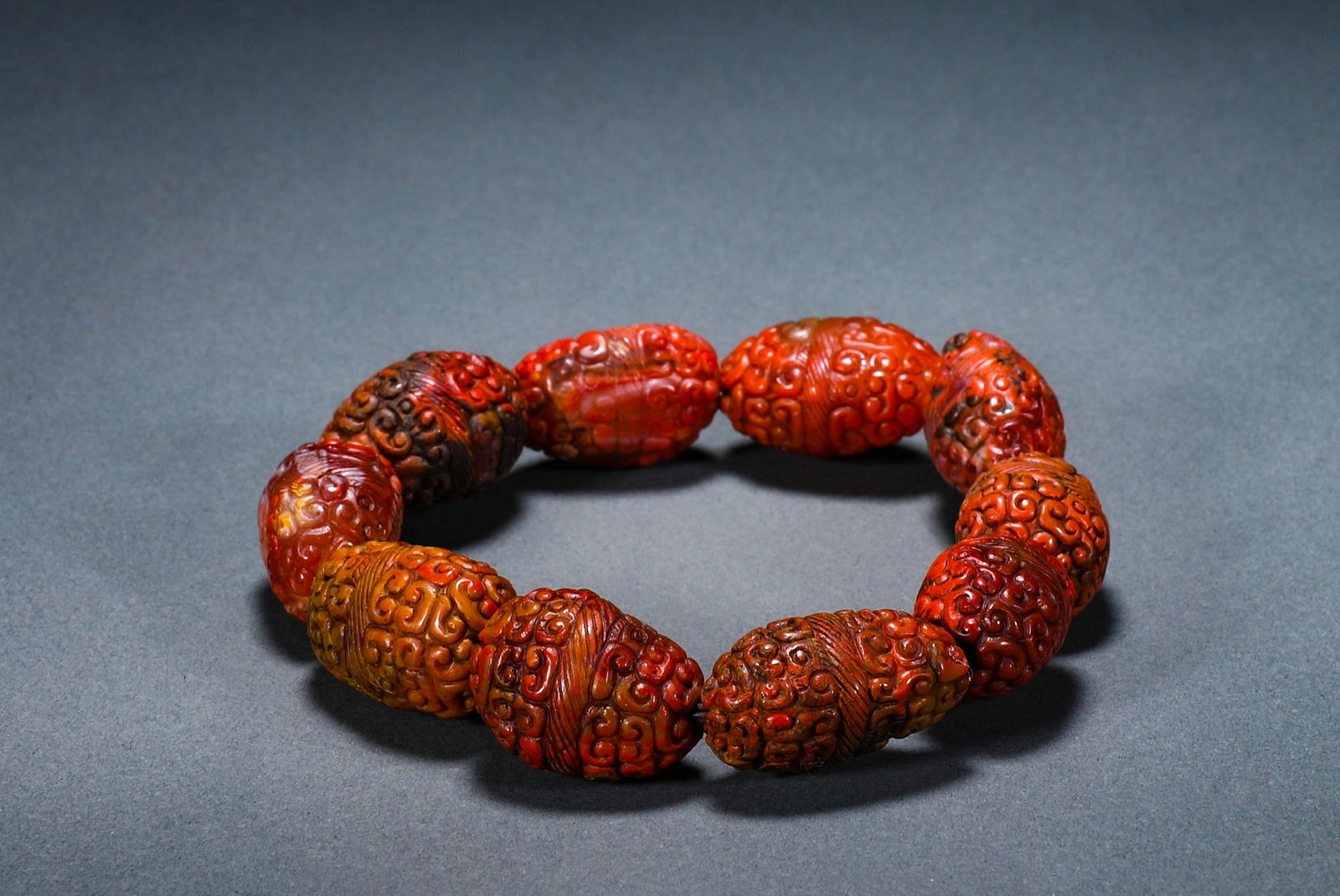 A CHINESE AGATE BALL BRACELET FROM THE WARRING STATES PERIOD: D:3.2cmWeight:120g