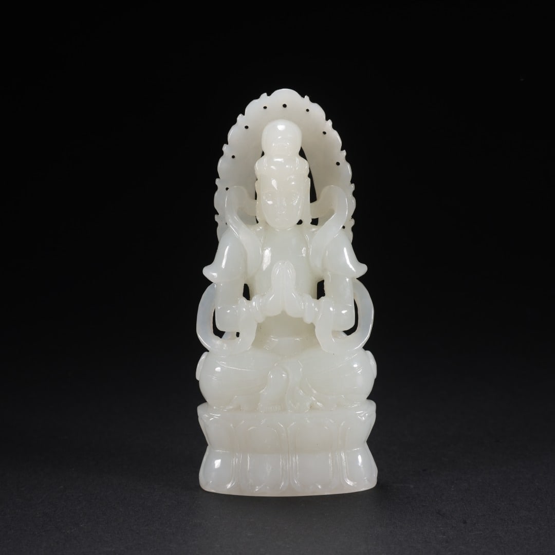 QING DYNASTY, HETIAN JADE SEATED GUANYIN WITH HANDS CLASPED: L:3.7cm W:1.9cm H:8.3cm Weight:75g