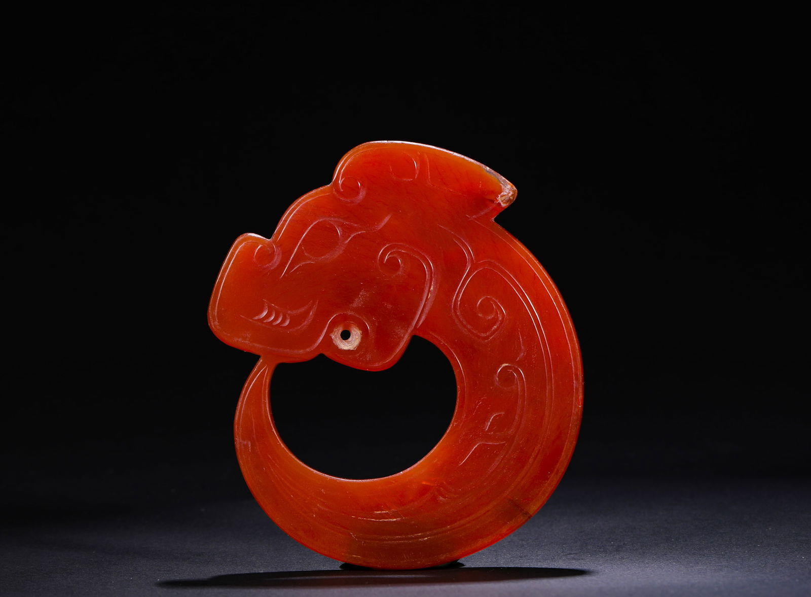 SHANG DYNASTY RED AGATE DRAGON PENDANT: H:9.7cmW:8.8cmWeight:90g