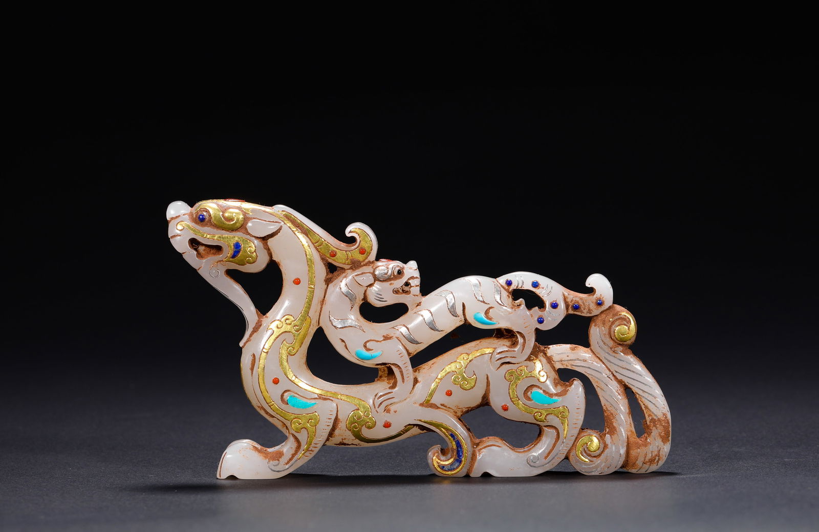 DURING THE WARRING STATES PERIOD, HETIAN JADE WAS ENGAGED IN A BATTLE OF GOLD AND SILVER DRAGONS AND (1 of 7)