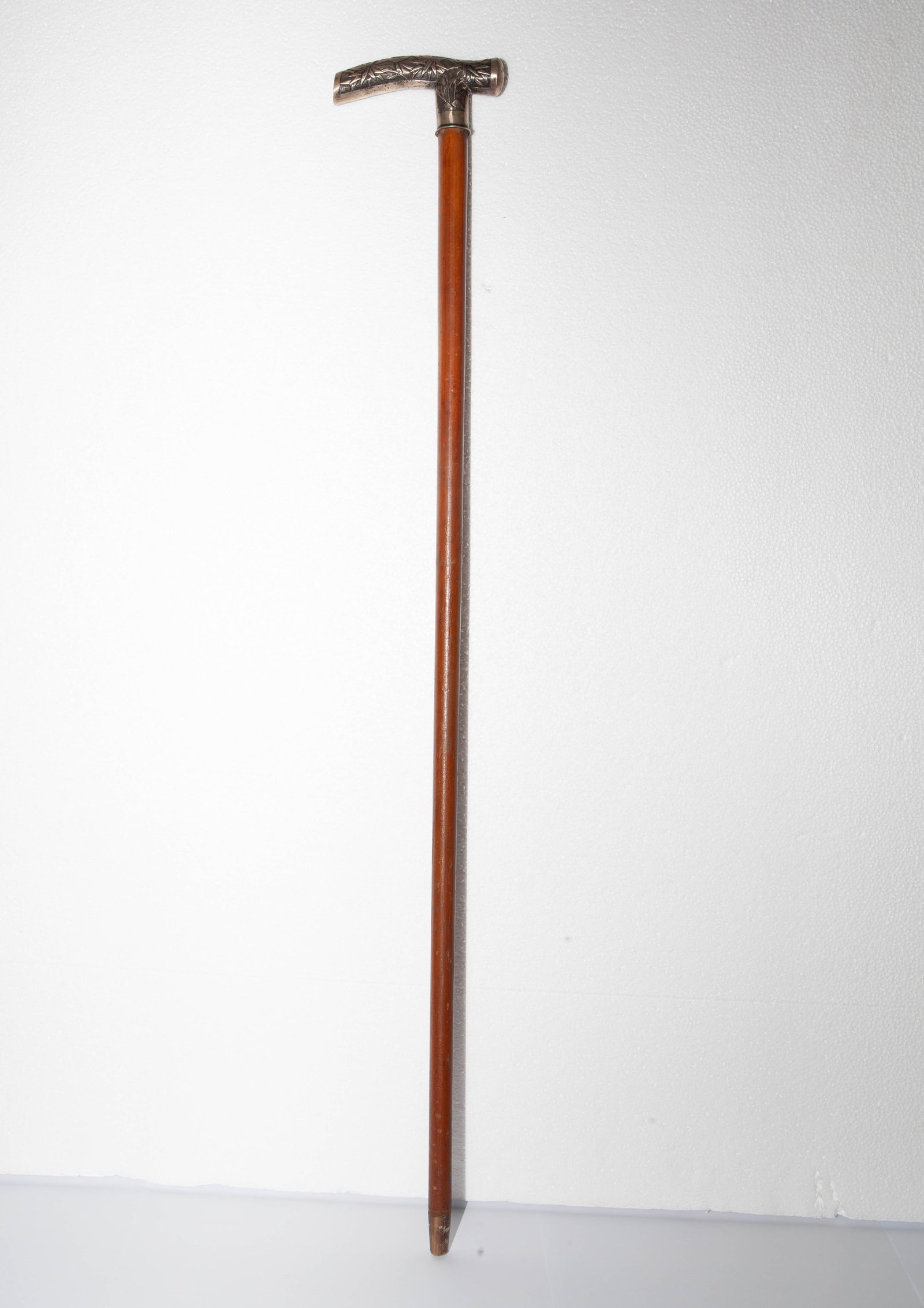 CUSTOM-MADE GENTLEMAN’S WALKING CANE, 1920, ART NOUVEAU, SOLID SILVER WITH CHINESE PATTERNS.: Length: 31.89" inches (81.0 cm)It features a fully carved silver handle, Malacca wood shaft (Indonesian century-old rattan), and buffalo horn ferrule. The handle is decorated with auspicious Chinese d