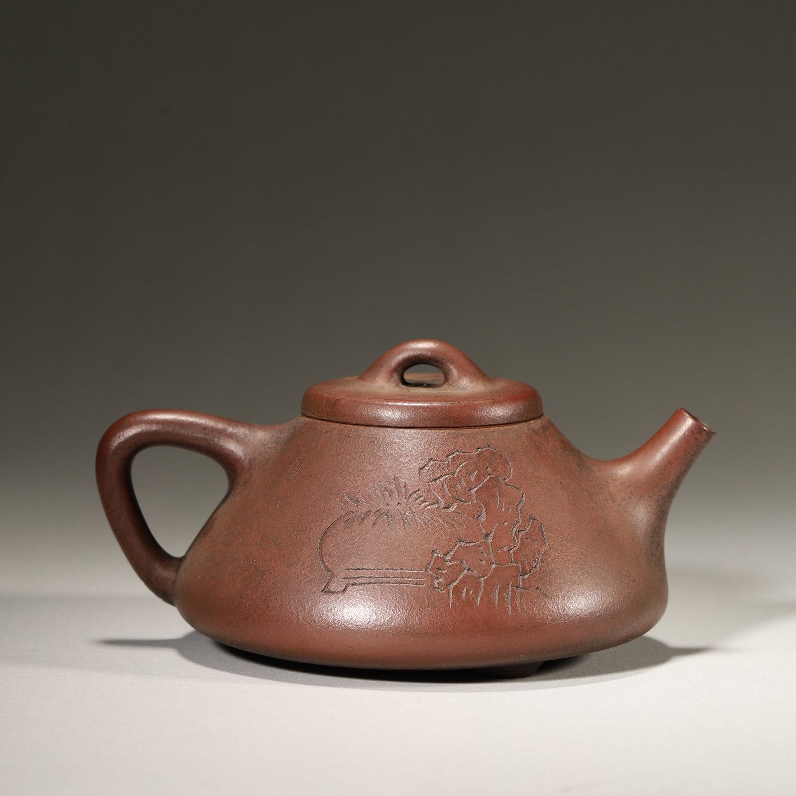A FINE MID-QING DYNASTY (18TH–19TH CENTURY) ZISHA SHIPIAO TEAPOT WITH QINGGONG PATTERNS AND POETIC (1 of 7)