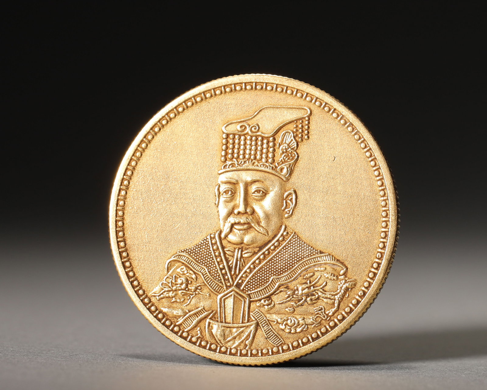 A FINE GOLD 'BING CHEN' COMMEMORATIVE MEDALLION (1 of 6)