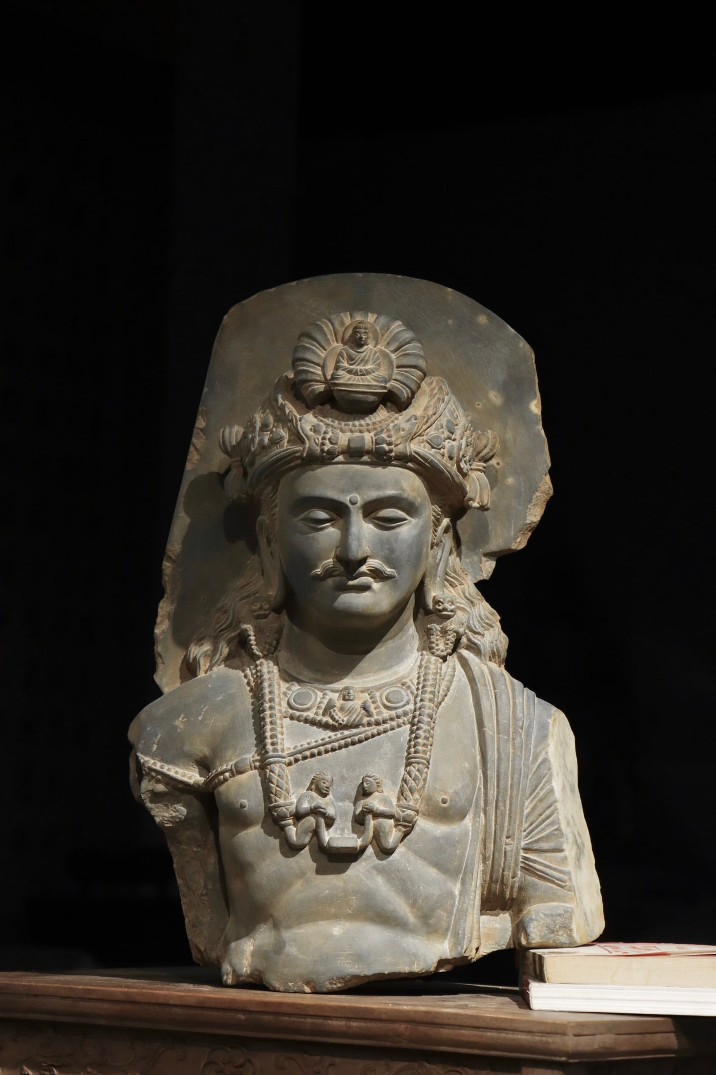A FINE GREY SCHIST BUST OF A BODHISATTVA, GANDHARA, KUSHAN PERIOD, 2ND–3RD CENTURY AD (1 of 9)