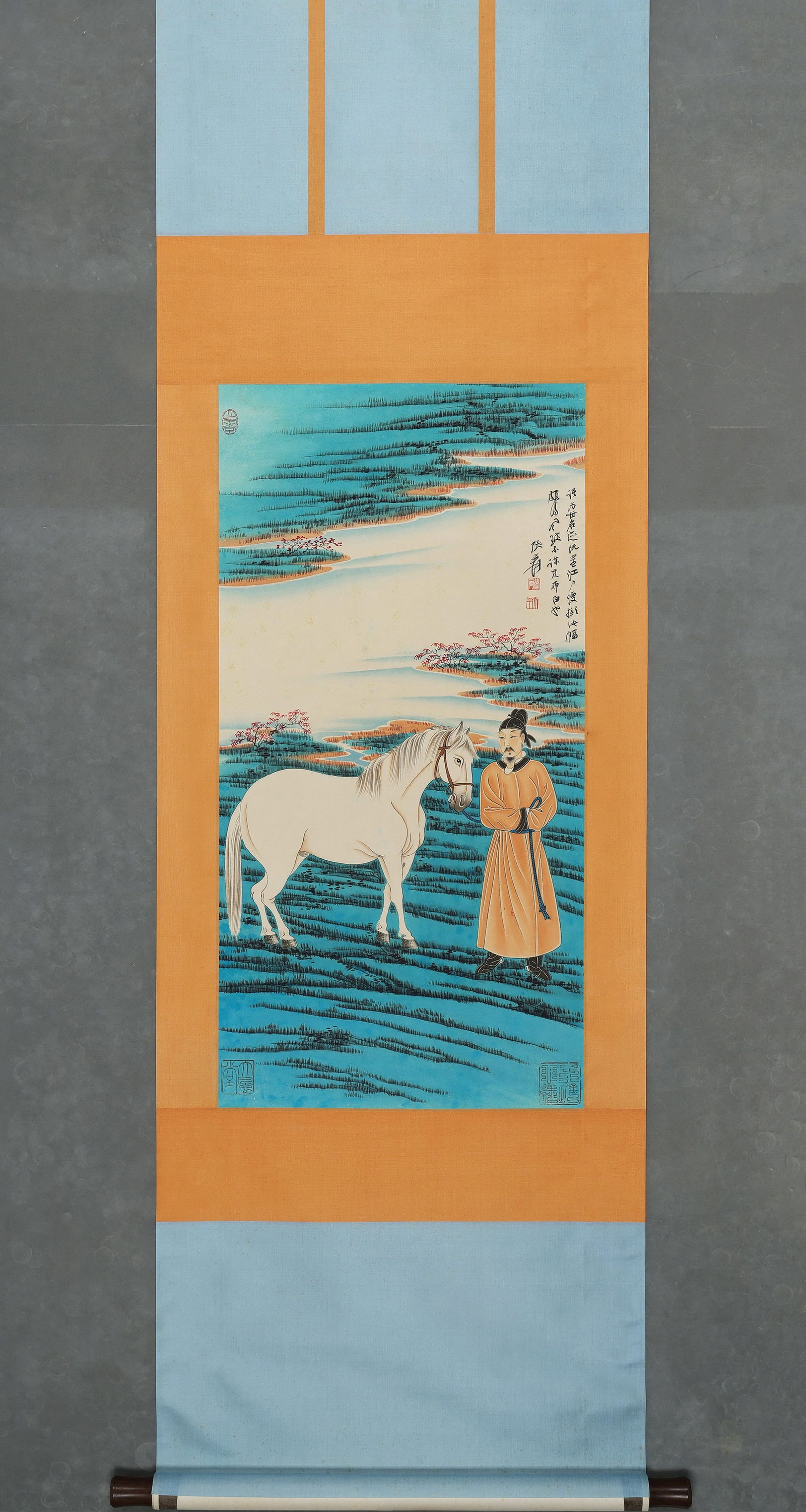 MODERN PERIOD: ZHANG DAQIAN - 'HORSES GRAZING IN SPRING PASTURE' - HANGING SCROLL, PAPER: Heart Size: 33.46" x 17.72" inches (85 cm x 45 cm)Zhang Daqian, Herding a Horse in the Spring Suburbs, ink and color on paper, hanging scroll. Depicting a Tang-dressed figure leading a white horse in